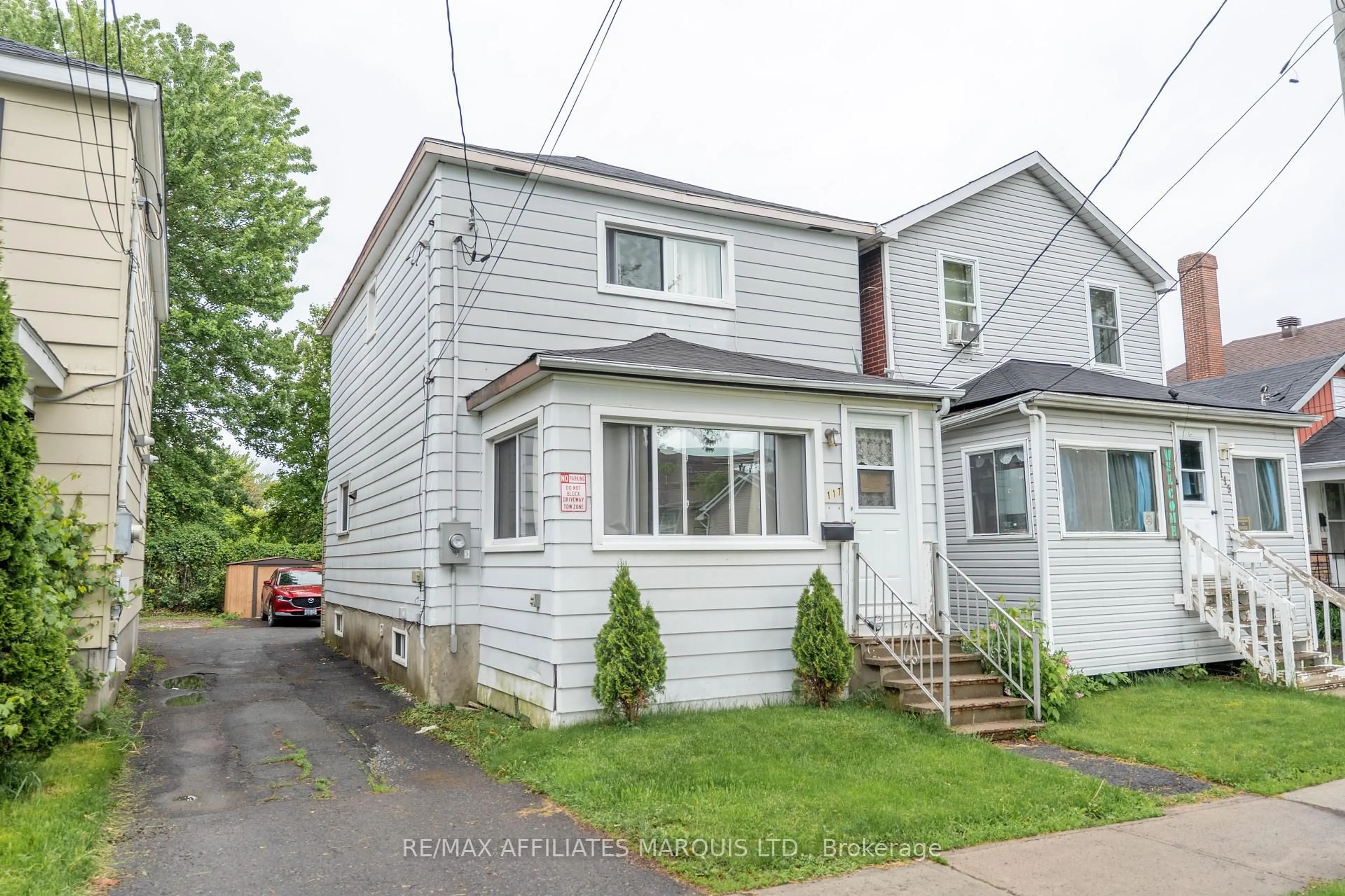 Home with vinyl exterior material, street for 117 St Felix St, Cornwall Ontario K6H 5A2