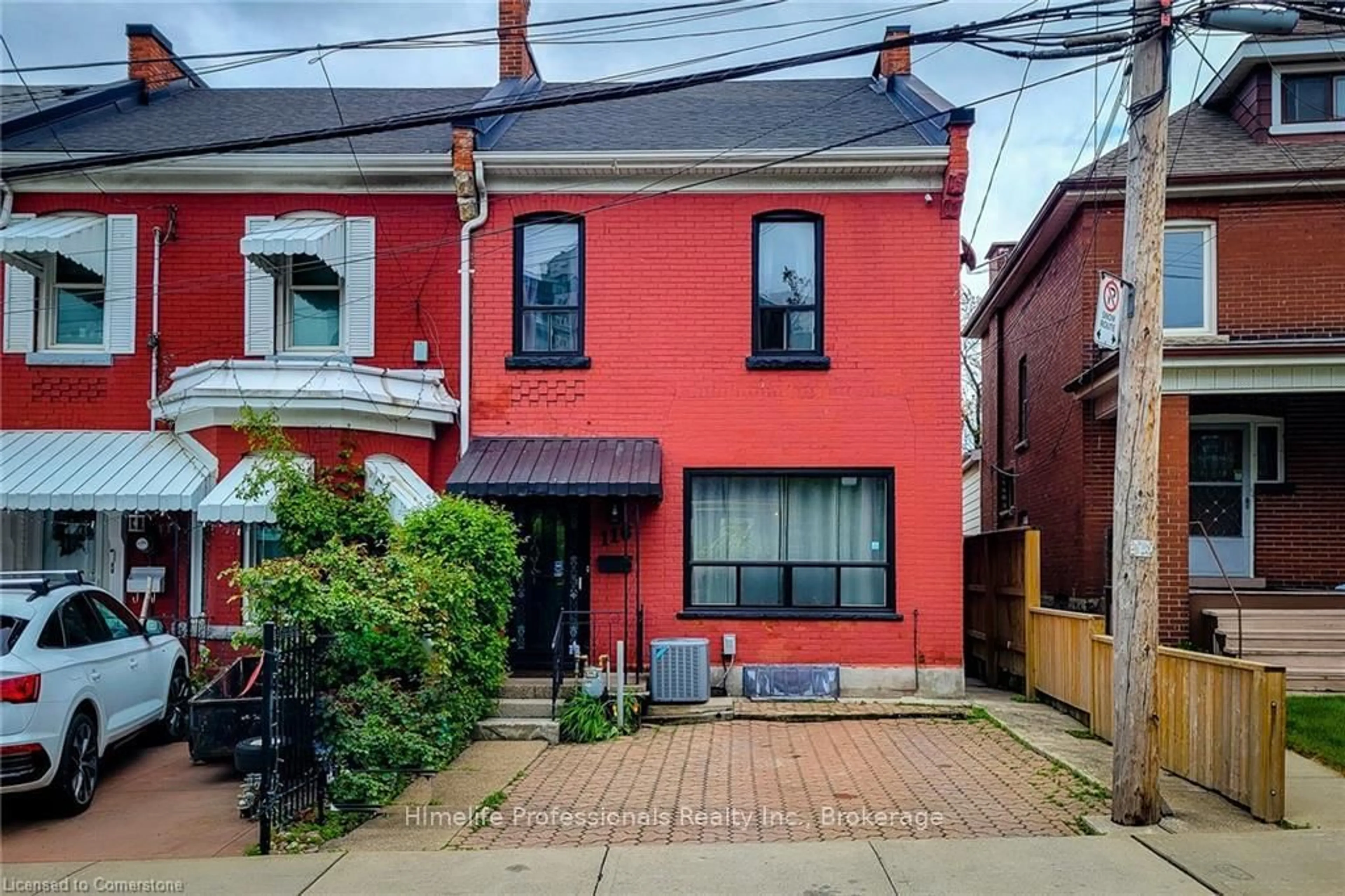 Home with brick exterior material, street for 116 Locke St, Hamilton Ontario L8R 3A8