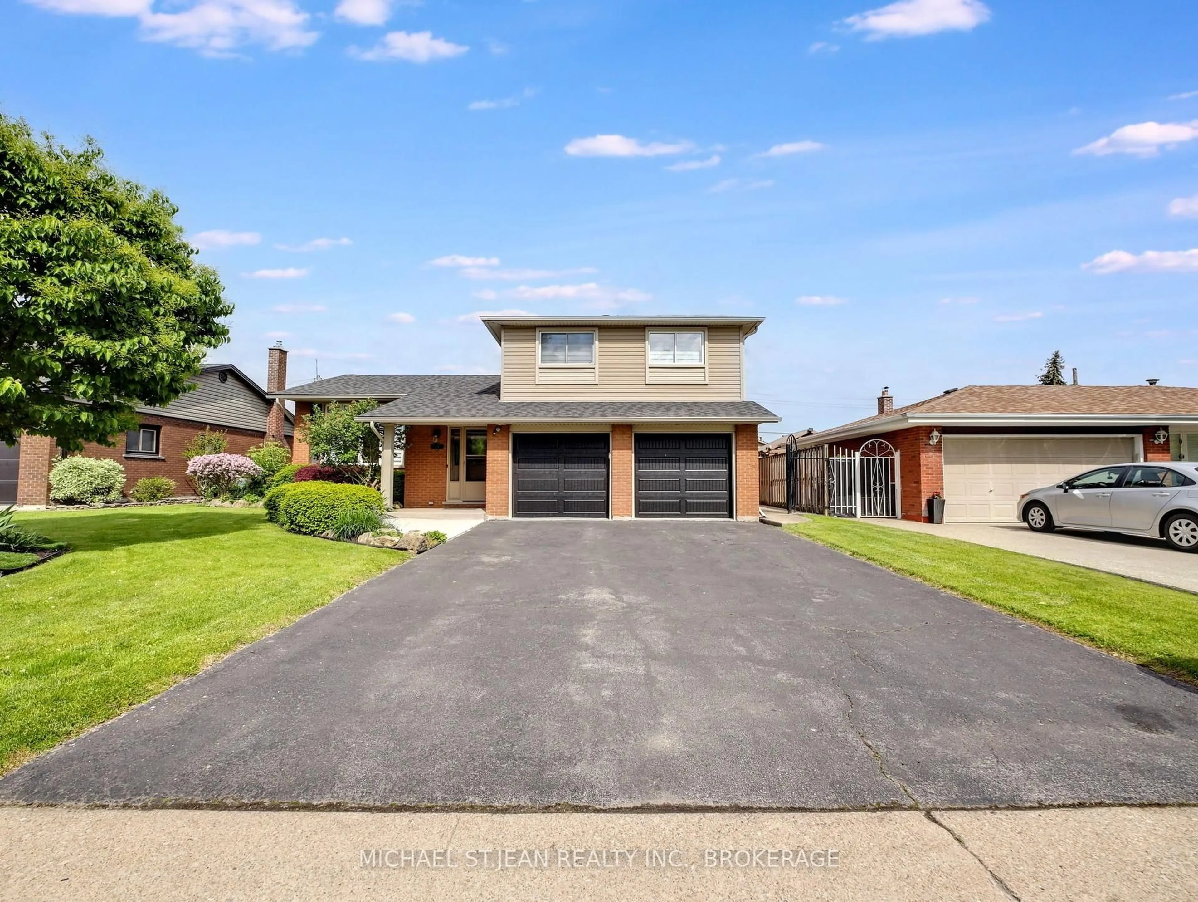 Home with brick exterior material, street for 207 Montmorency Dr, Hamilton Ontario L8K 5H3