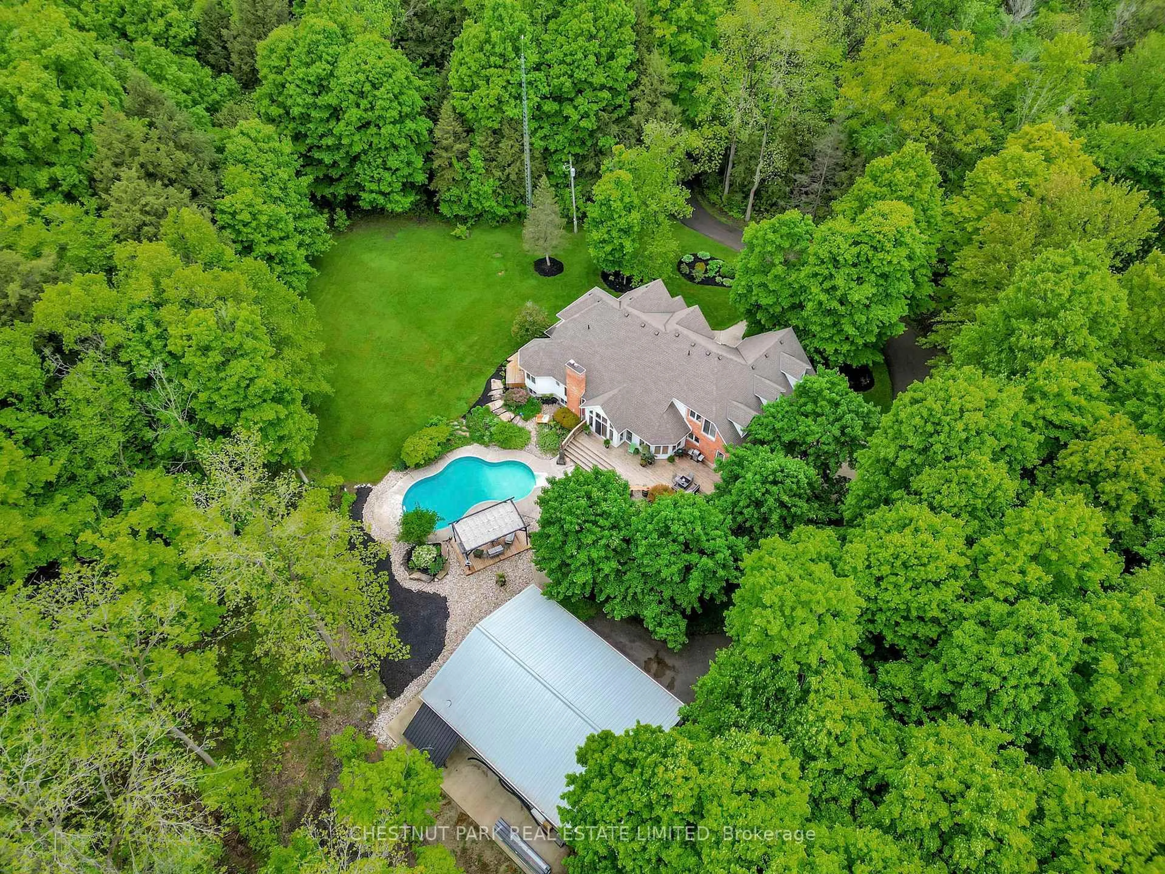 A pic from outside/outdoor area/front of a property/back of a property/a pic from drone, forest/trees view for 6511 Crowsfoot Rd, Woolwich Ontario N0B 1M0