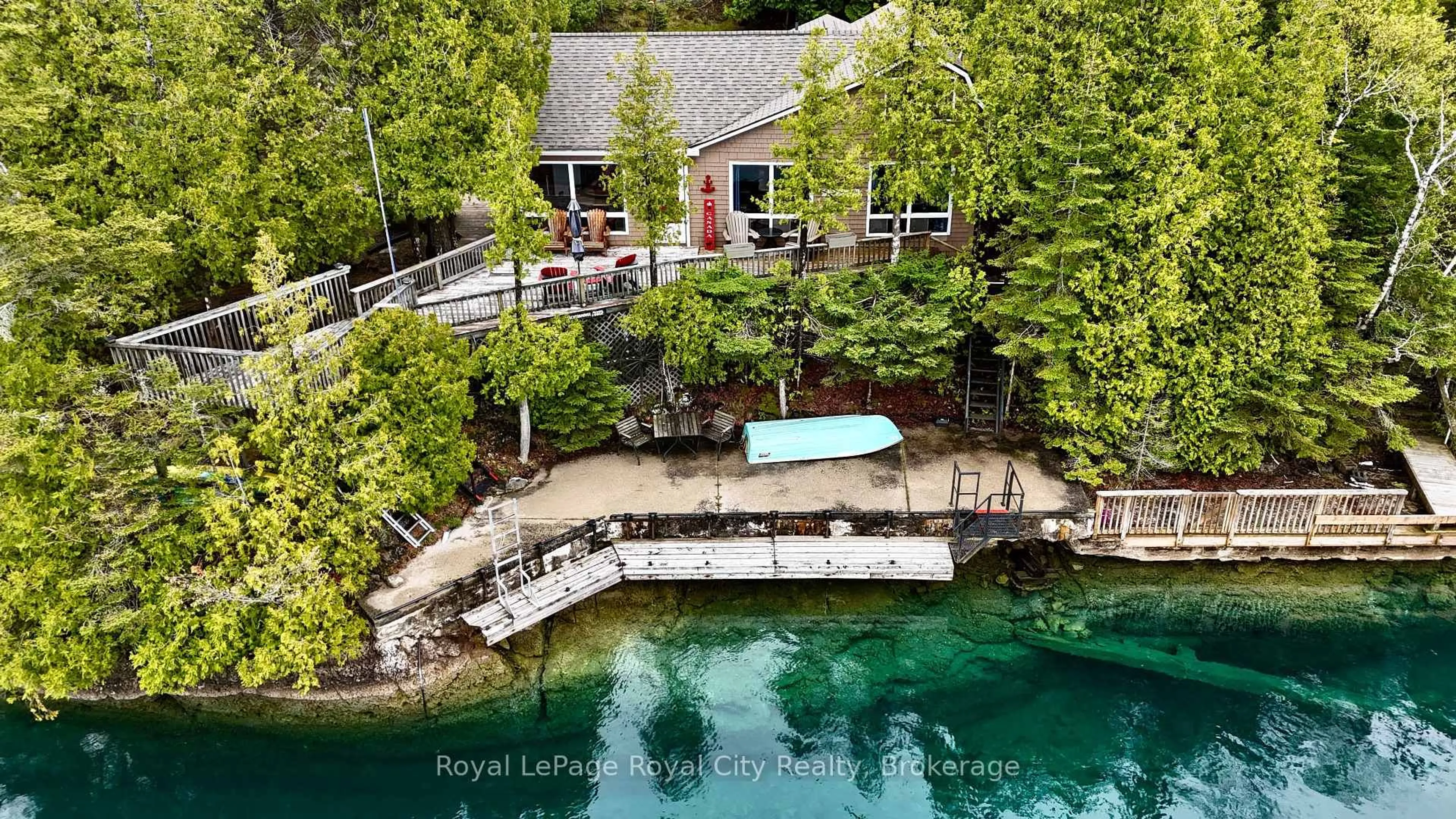 A pic from outside/outdoor area/front of a property/back of a property/a pic from drone, water/lake/river/ocean view for 120 Big Tub Rd, Northern Bruce Peninsula Ontario N0H 2R0