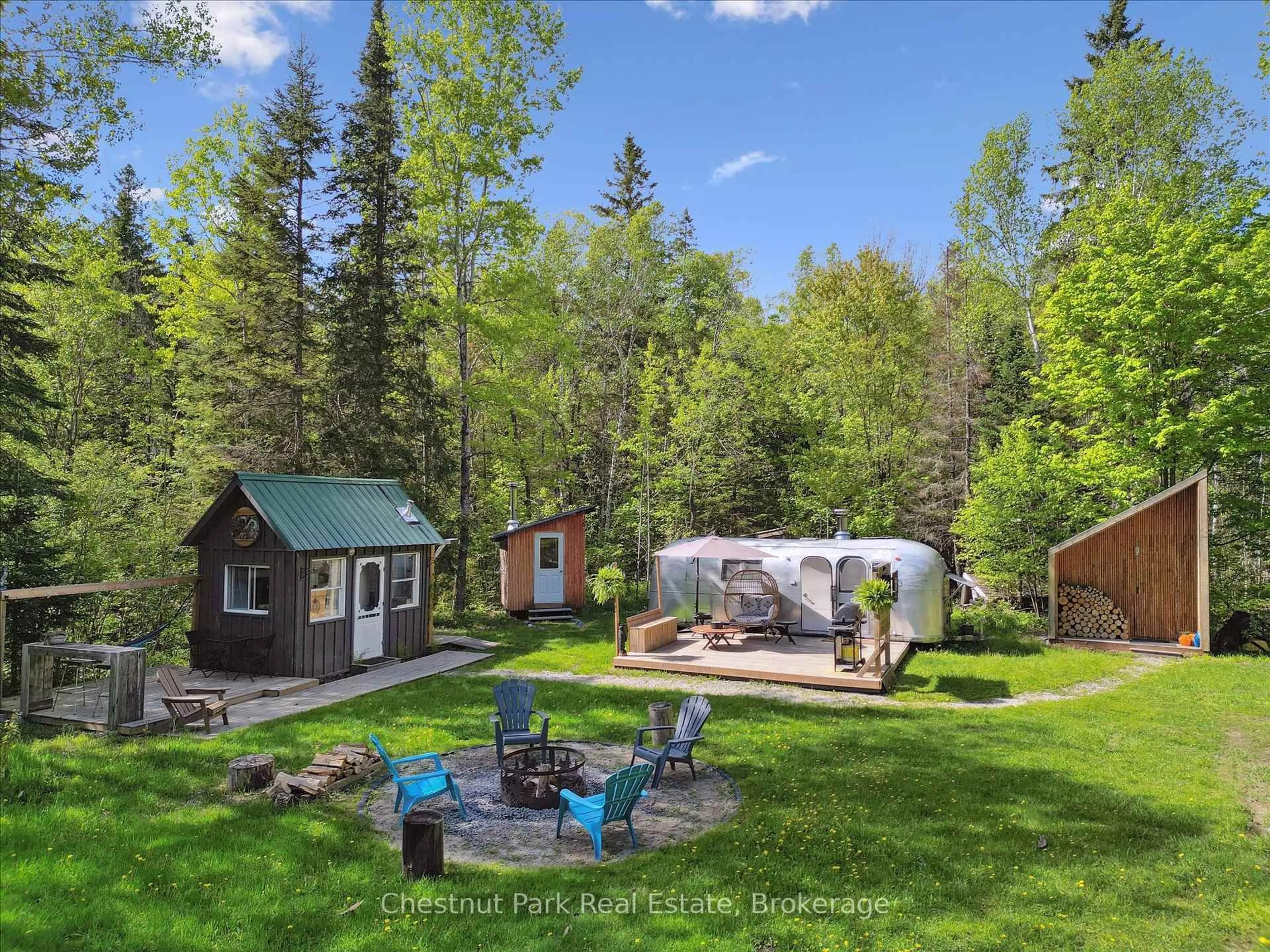 A pic from outside/outdoor area/front of a property/back of a property/a pic from drone, forest/trees view for 216 Blackwater Lake Rd, Seguin Ontario P2A 0B6