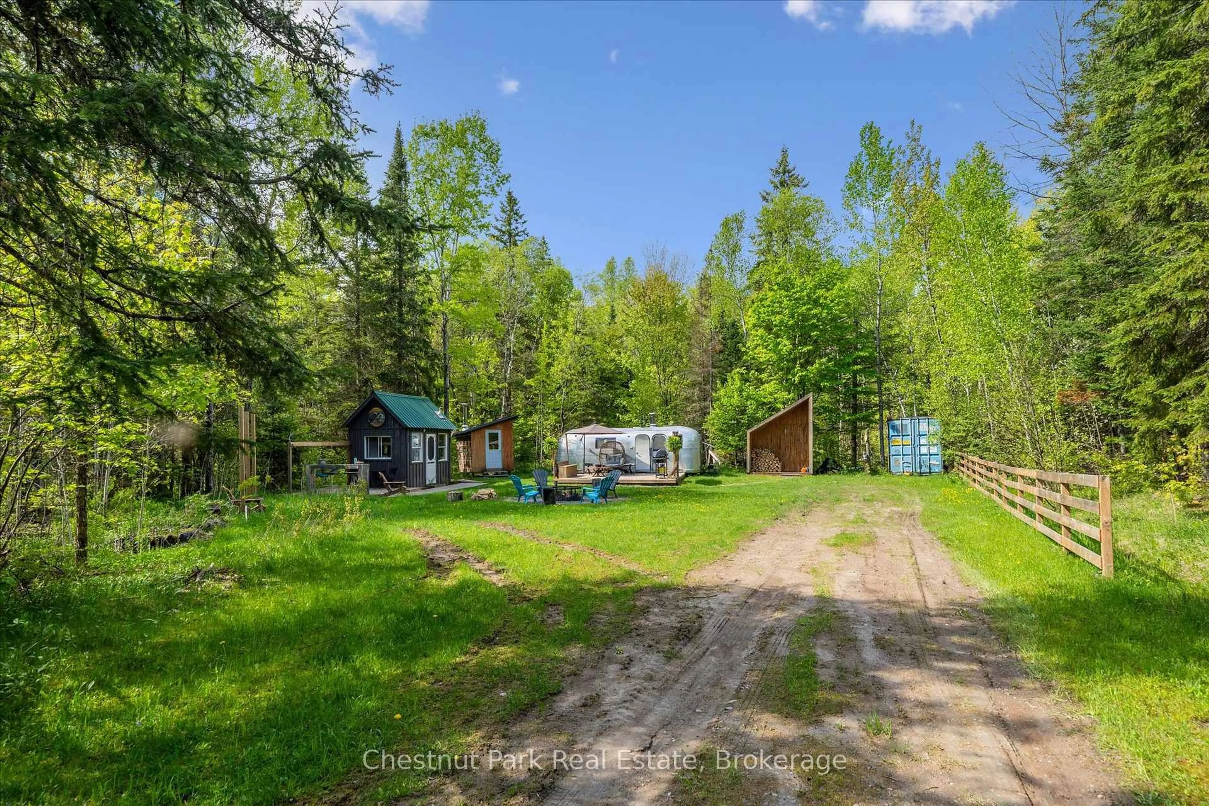 A pic from outside/outdoor area/front of a property/back of a property/a pic from drone, forest/trees view for 216 Blackwater Lake Rd, Seguin Ontario P2A 0B6