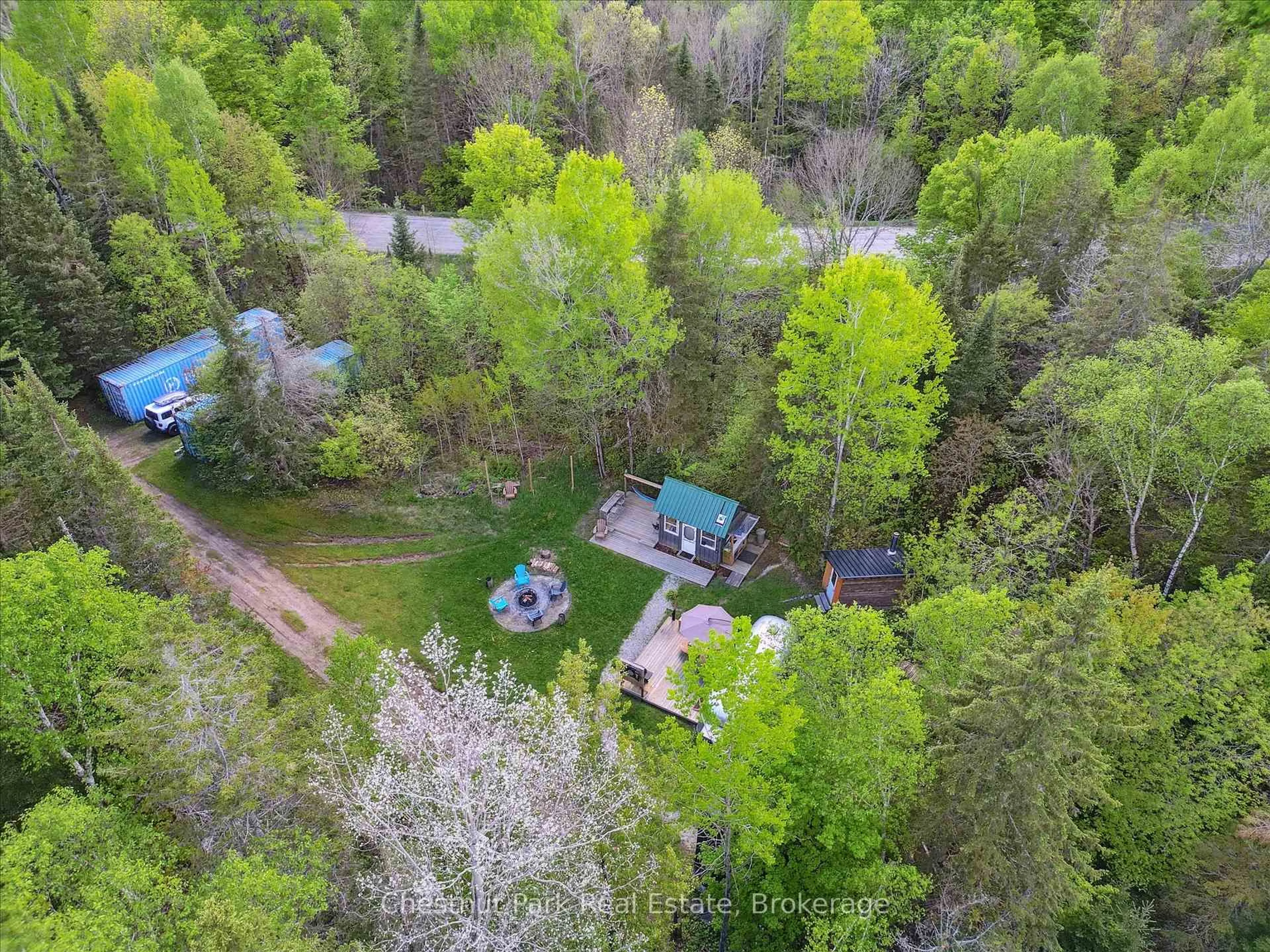 A pic from outside/outdoor area/front of a property/back of a property/a pic from drone, forest/trees view for 216 Blackwater Lake Rd, Seguin Ontario P2A 0B6