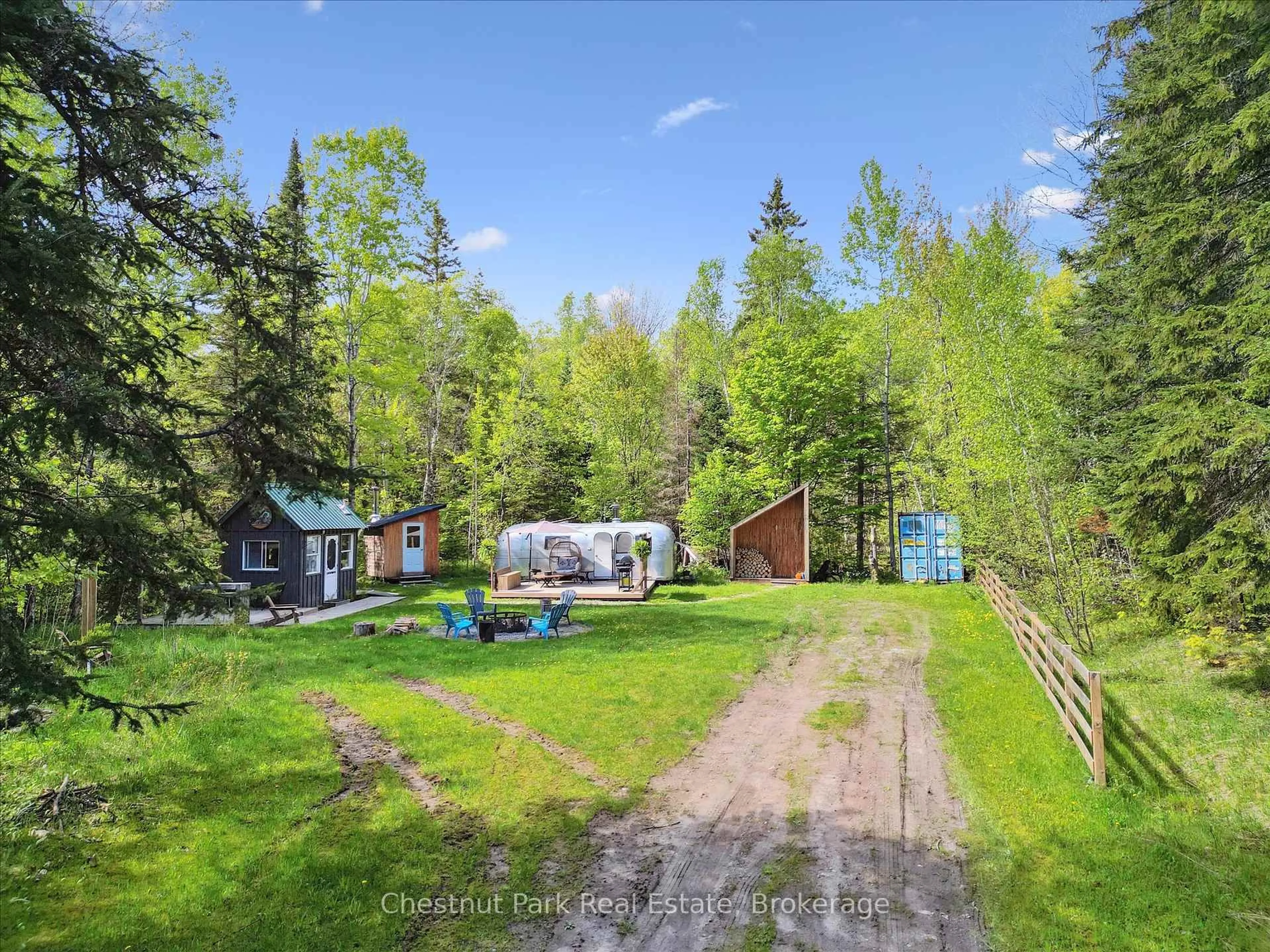 A pic from outside/outdoor area/front of a property/back of a property/a pic from drone, forest/trees view for 216 Blackwater Lake Rd, Seguin Ontario P2A 0B6