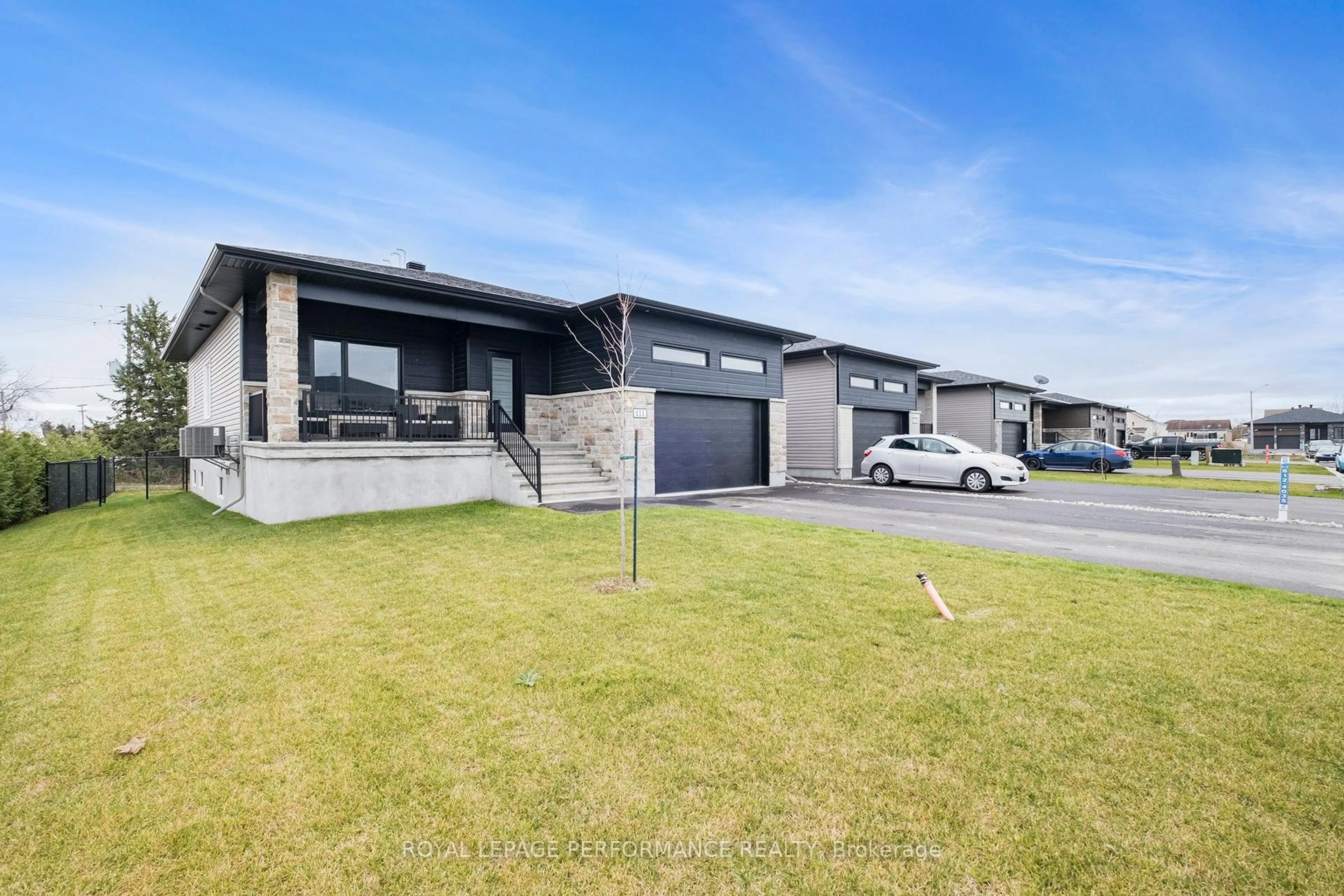 A pic from outside/outdoor area/front of a property/back of a property/a pic from drone, street for 111 Chateauguay St, Russell Ontario K0A 1W0