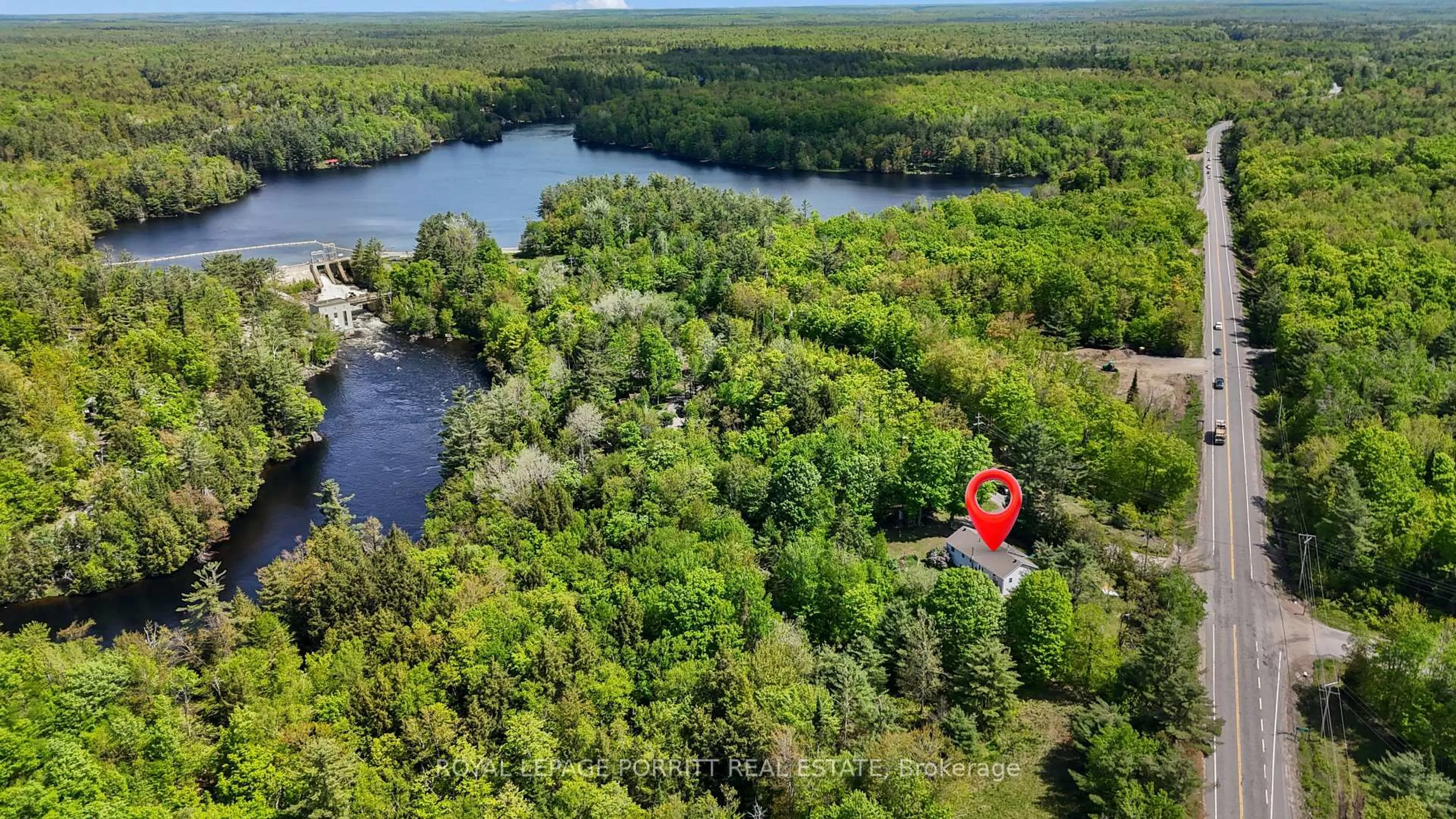 A pic from outside/outdoor area/front of a property/back of a property/a pic from drone, water/lake/river/ocean view for 1101 Hawn Rd, Bracebridge Ontario P1L 1X1