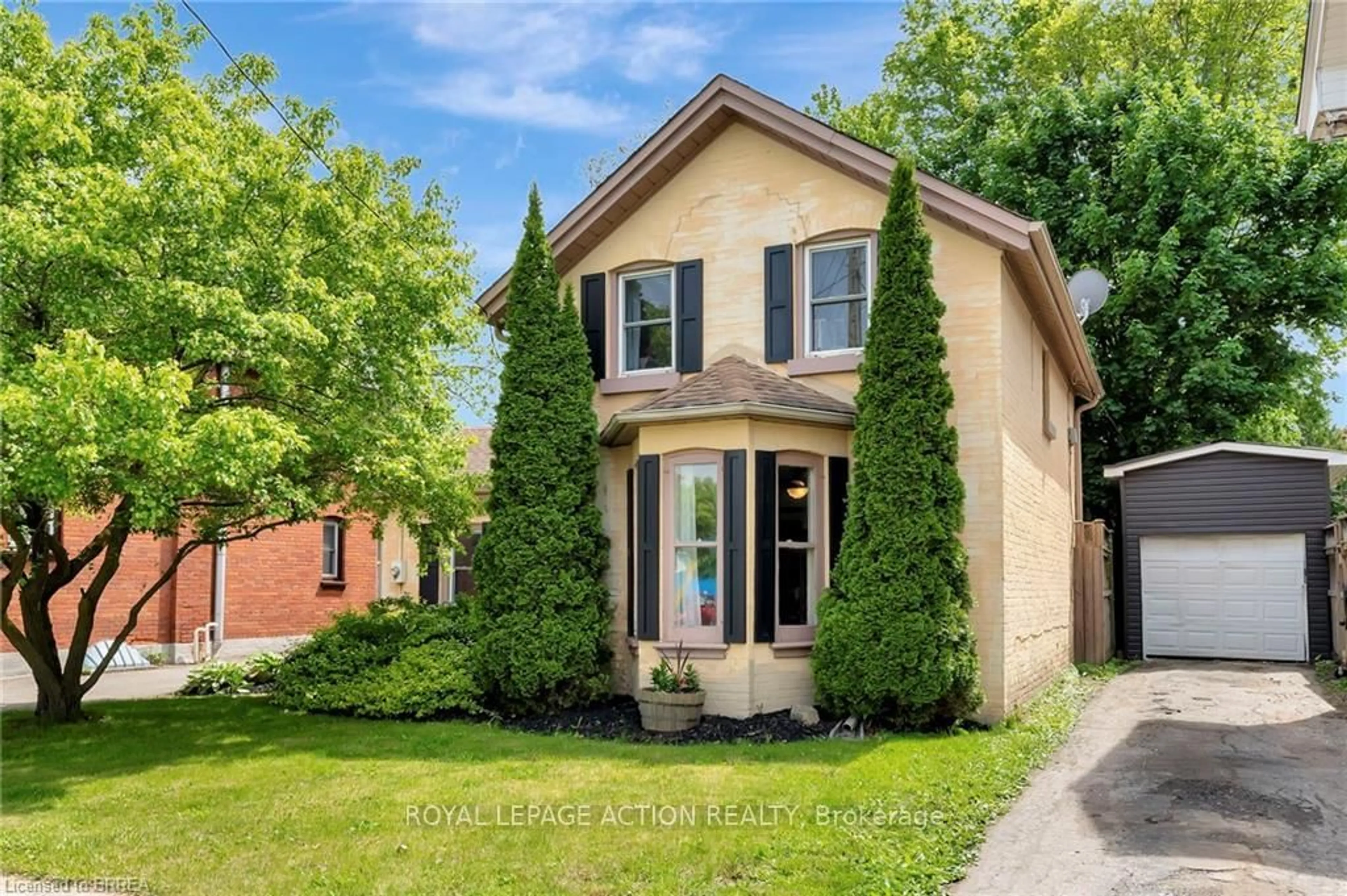 Home with brick exterior material, street for 4 Palmerston Ave, Brantford Ontario N3T 4K9