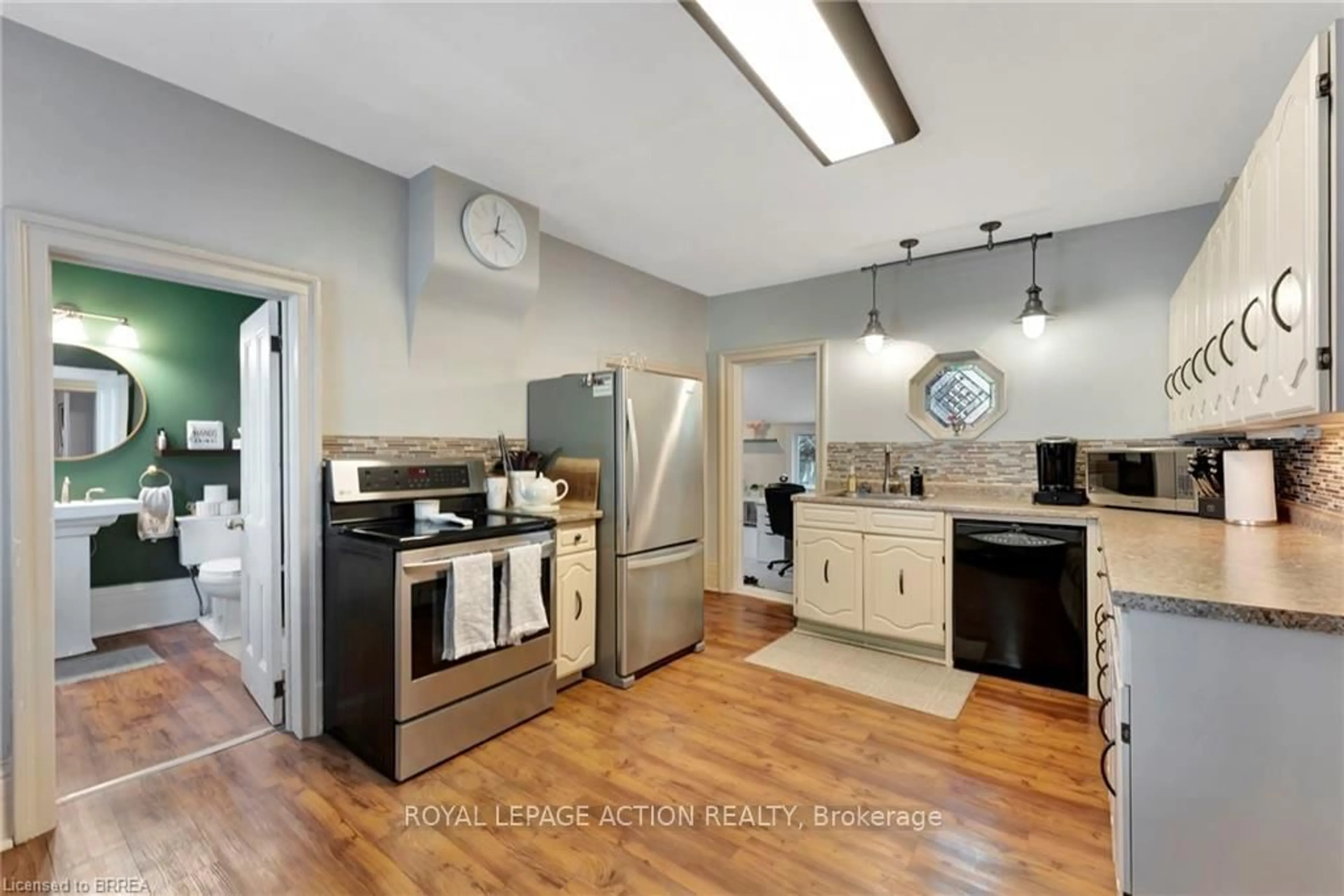 Kitchen with laundary machines, unknown for 4 Palmerston Ave, Brantford Ontario N3T 4K9