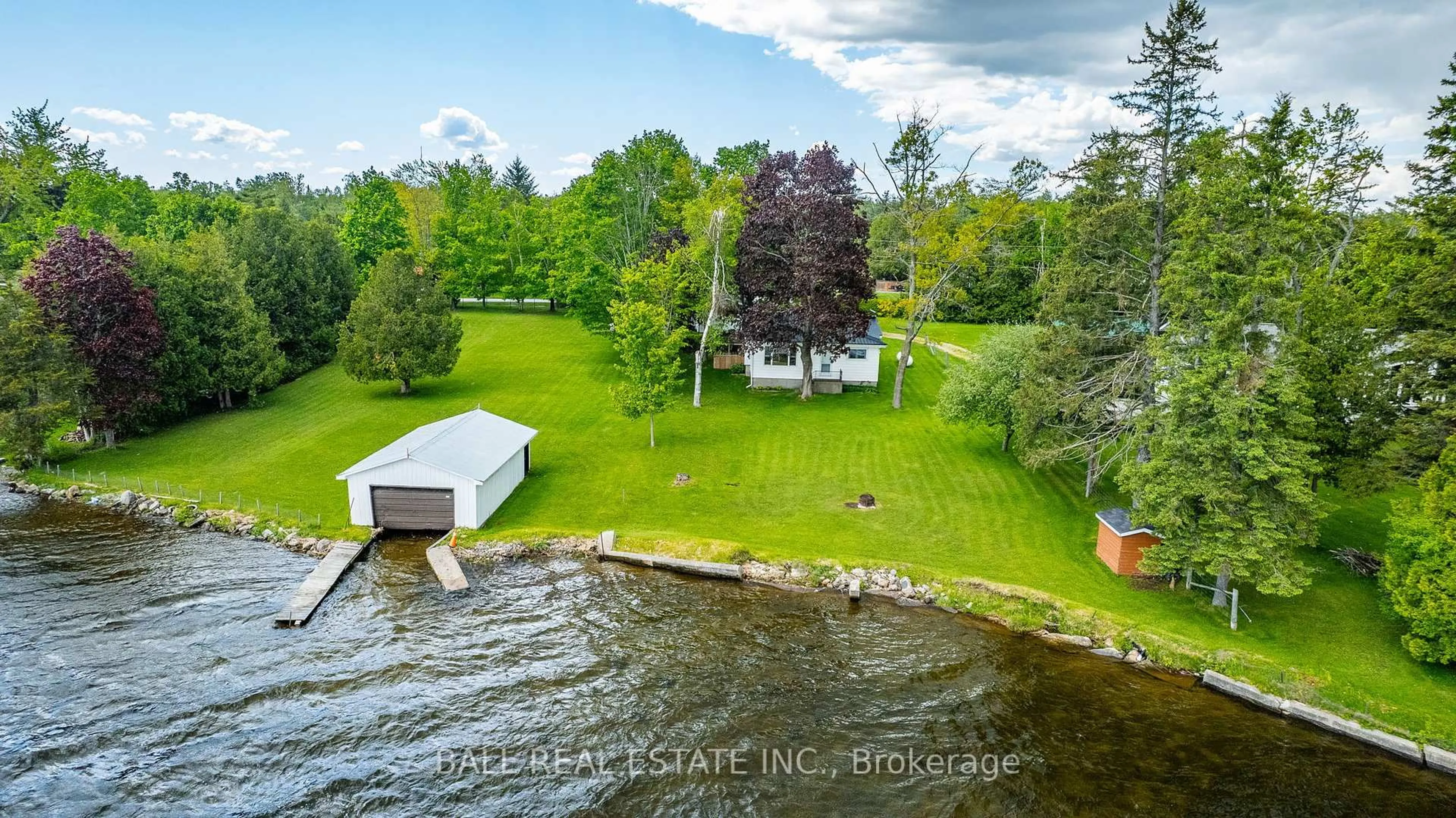 A pic from outside/outdoor area/front of a property/back of a property/a pic from drone, water/lake/river/ocean view for 280 Lakeshore Dr, Kawartha Lakes Ontario K0M 1A0