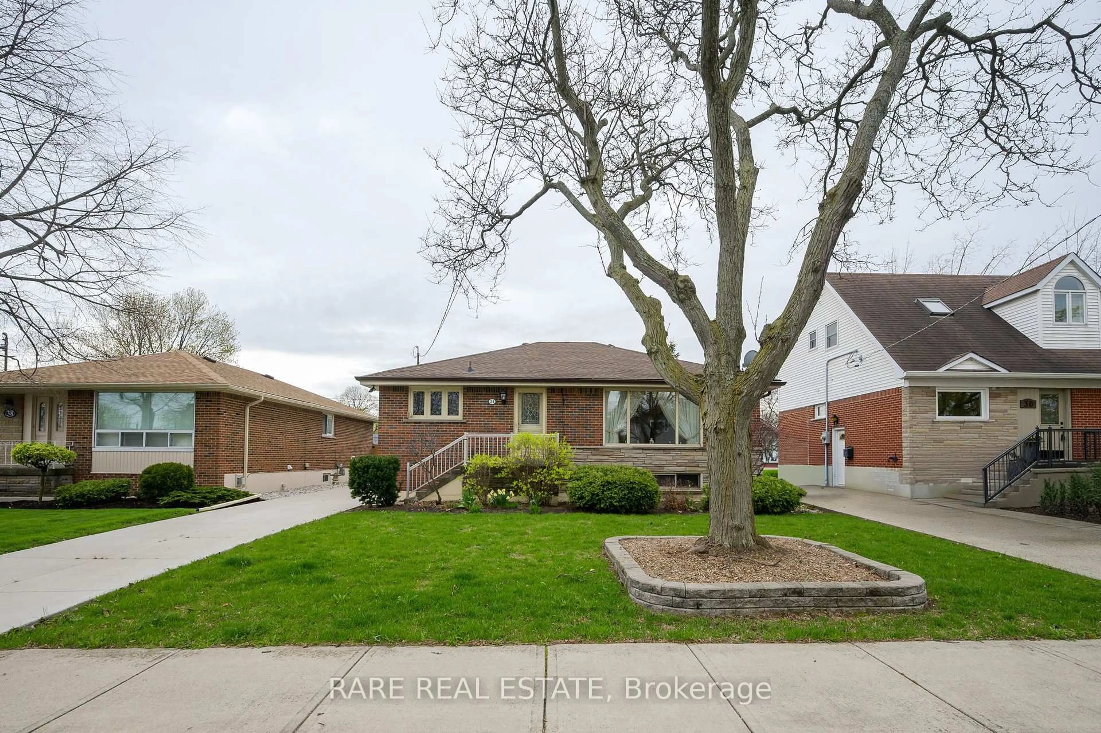 Home with brick exterior material, street for 34 CARMEN Ave, Hamilton Ontario L8V 2H6