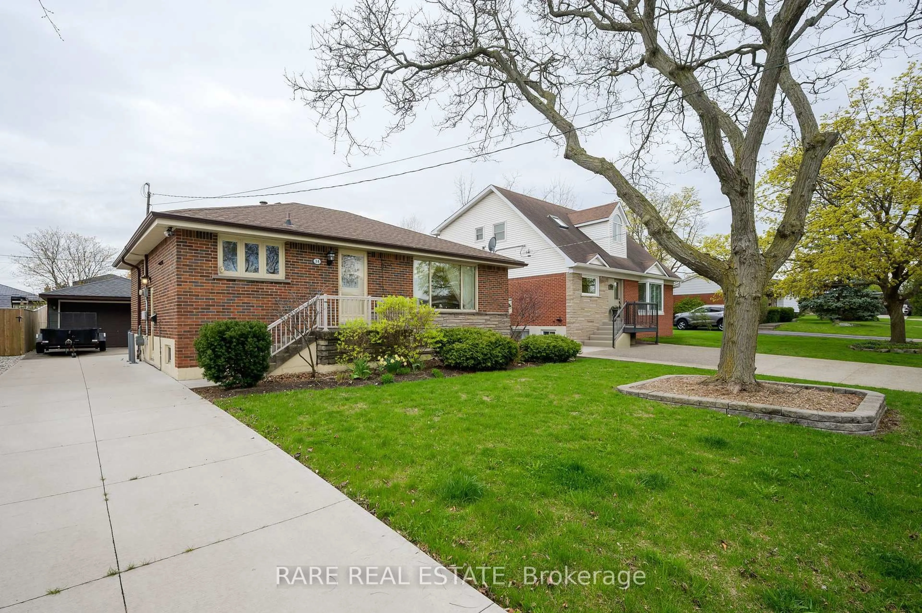 Home with brick exterior material, street for 34 CARMEN Ave, Hamilton Ontario L8V 2H6