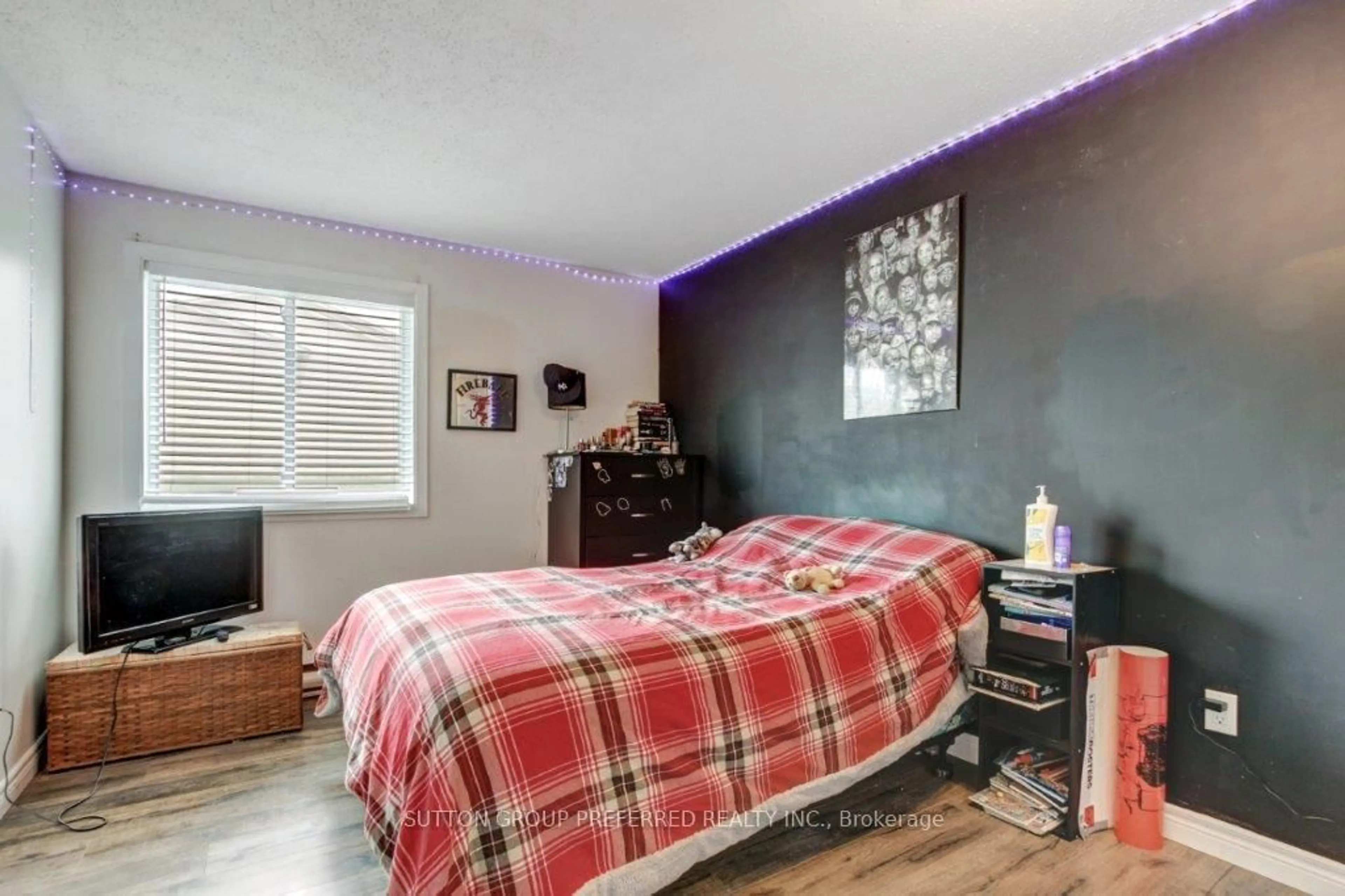 Bedroom with bed, wood/laminate floor for 733 Deveron Cres #116, London South Ontario N5Z 4X7