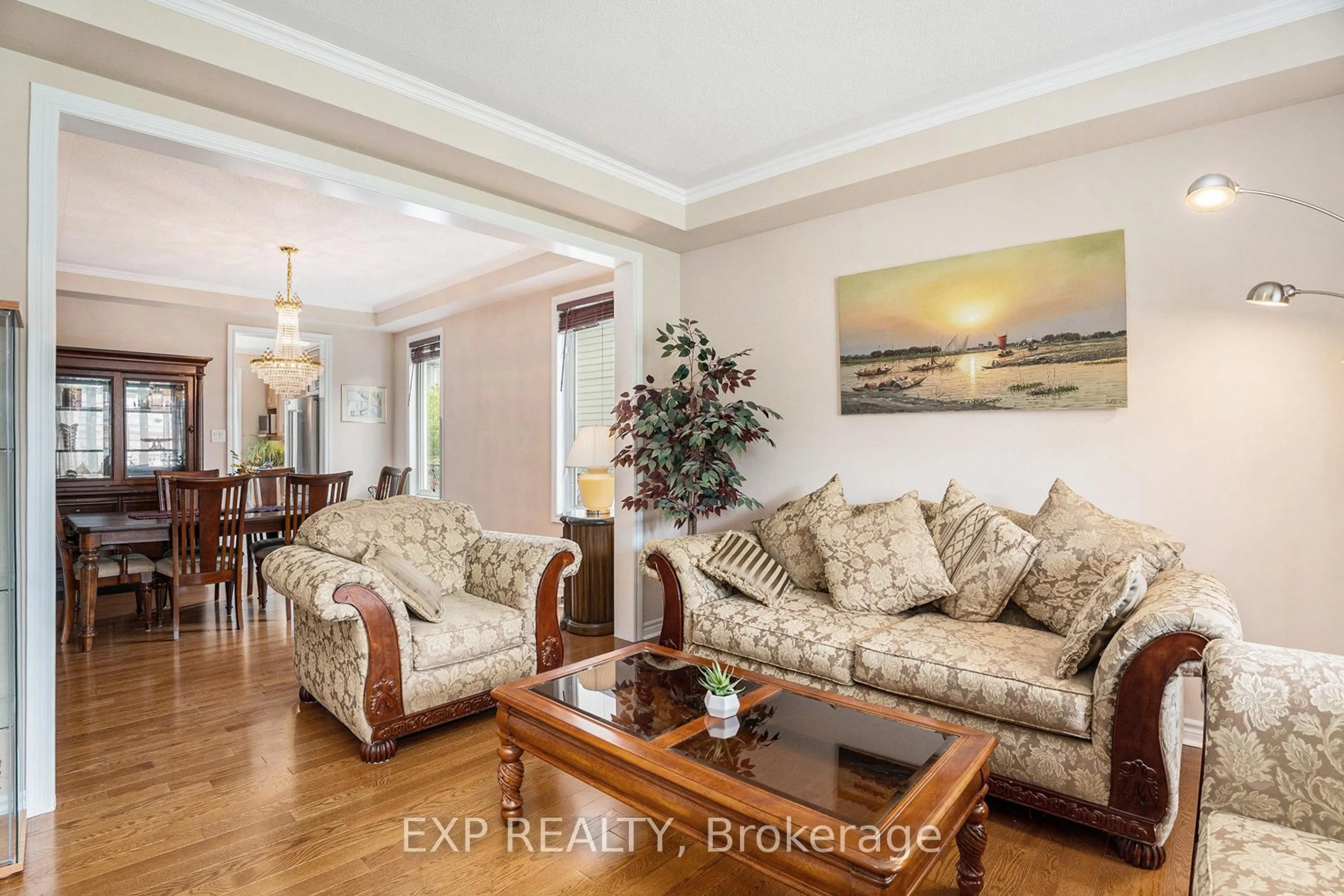 Living room with furniture, wood/laminate floor for 2184 Sunset Cove Circ, Ottawa Ontario K2J 0T8