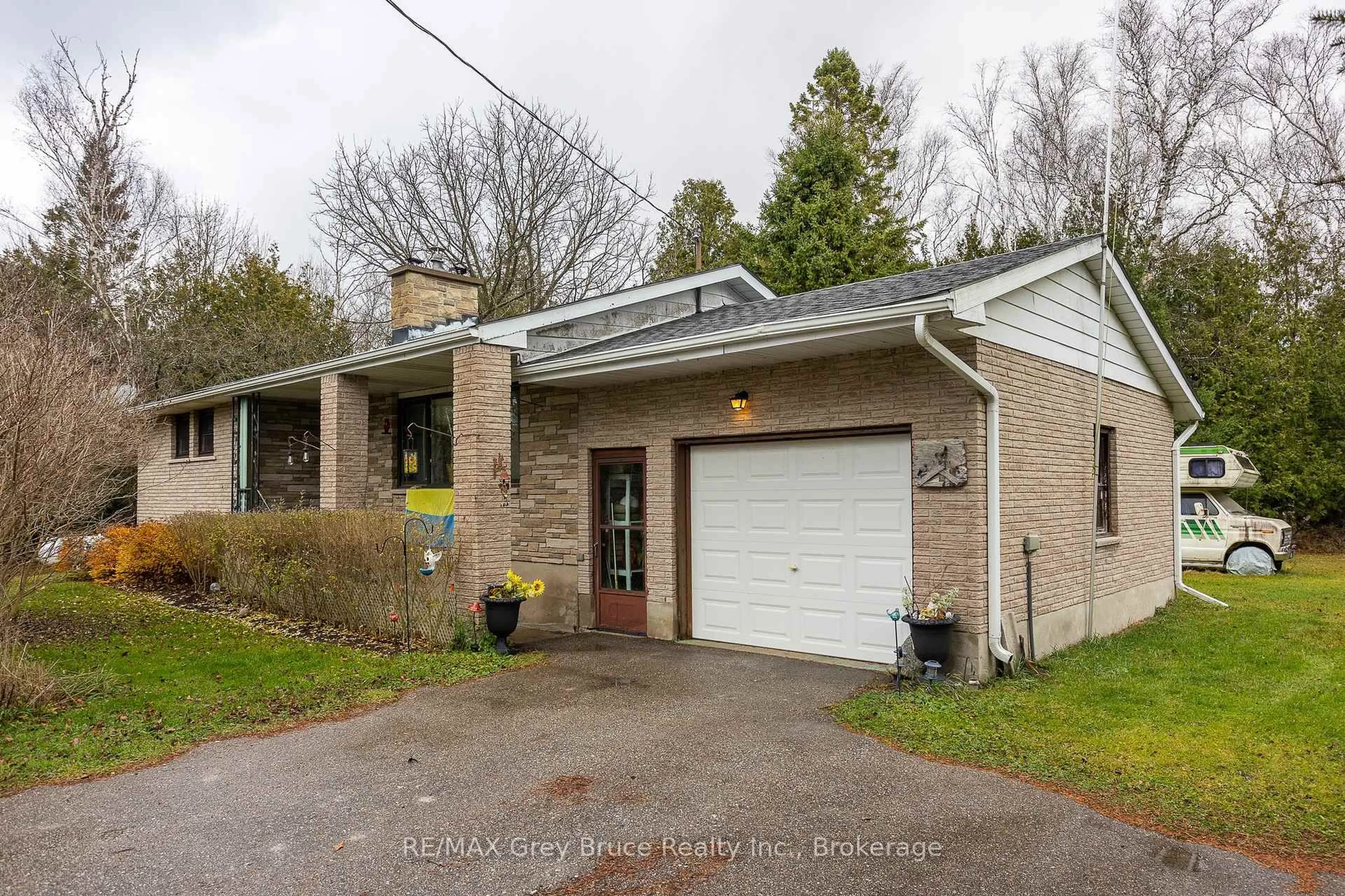 Home with brick exterior material, street for 564 MUNICIPAL Rd, South Bruce Peninsula Ontario N0H 2G0