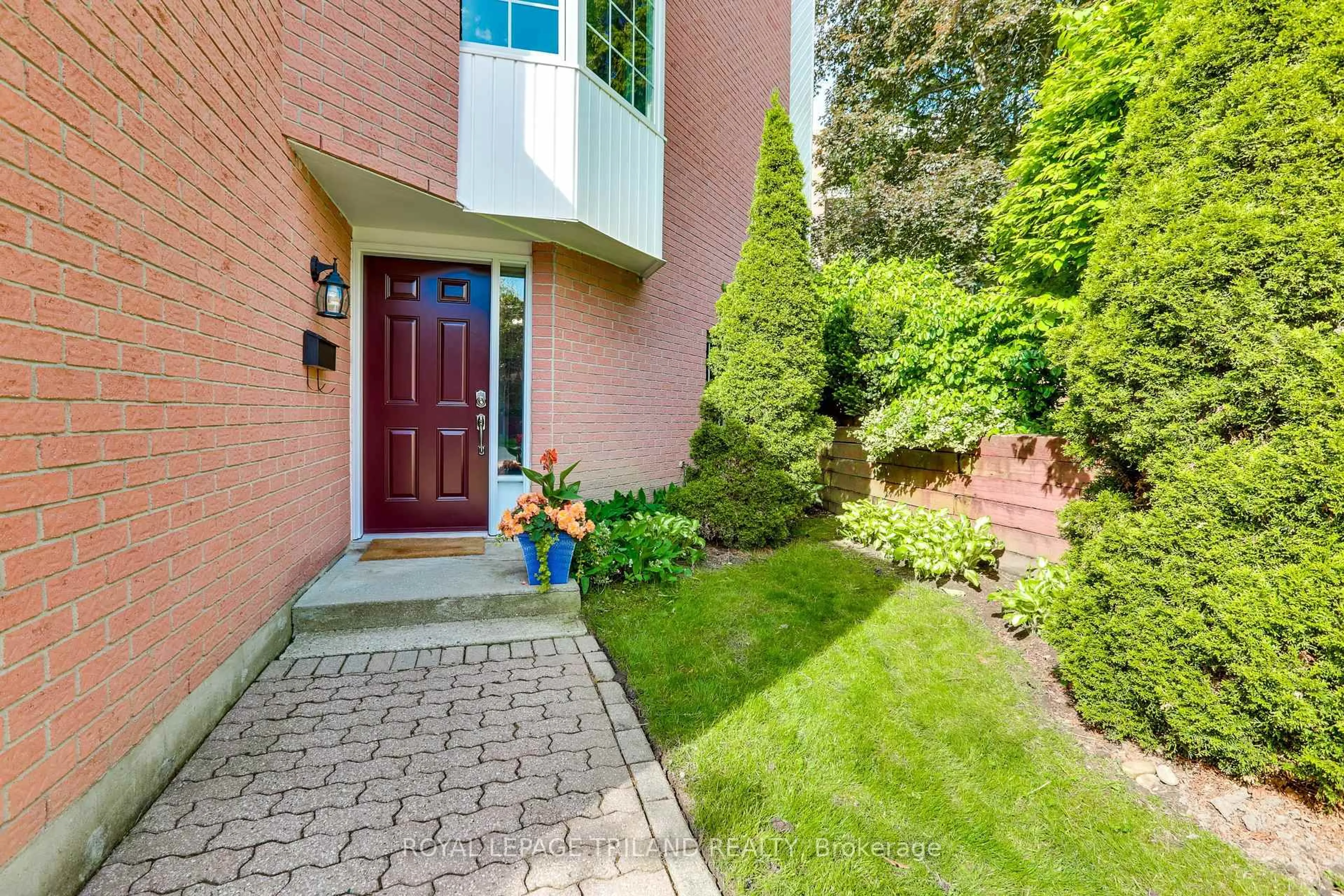 Home with brick exterior material, street for 703 Windermere Rd #77, London North Ontario N5X 2P1