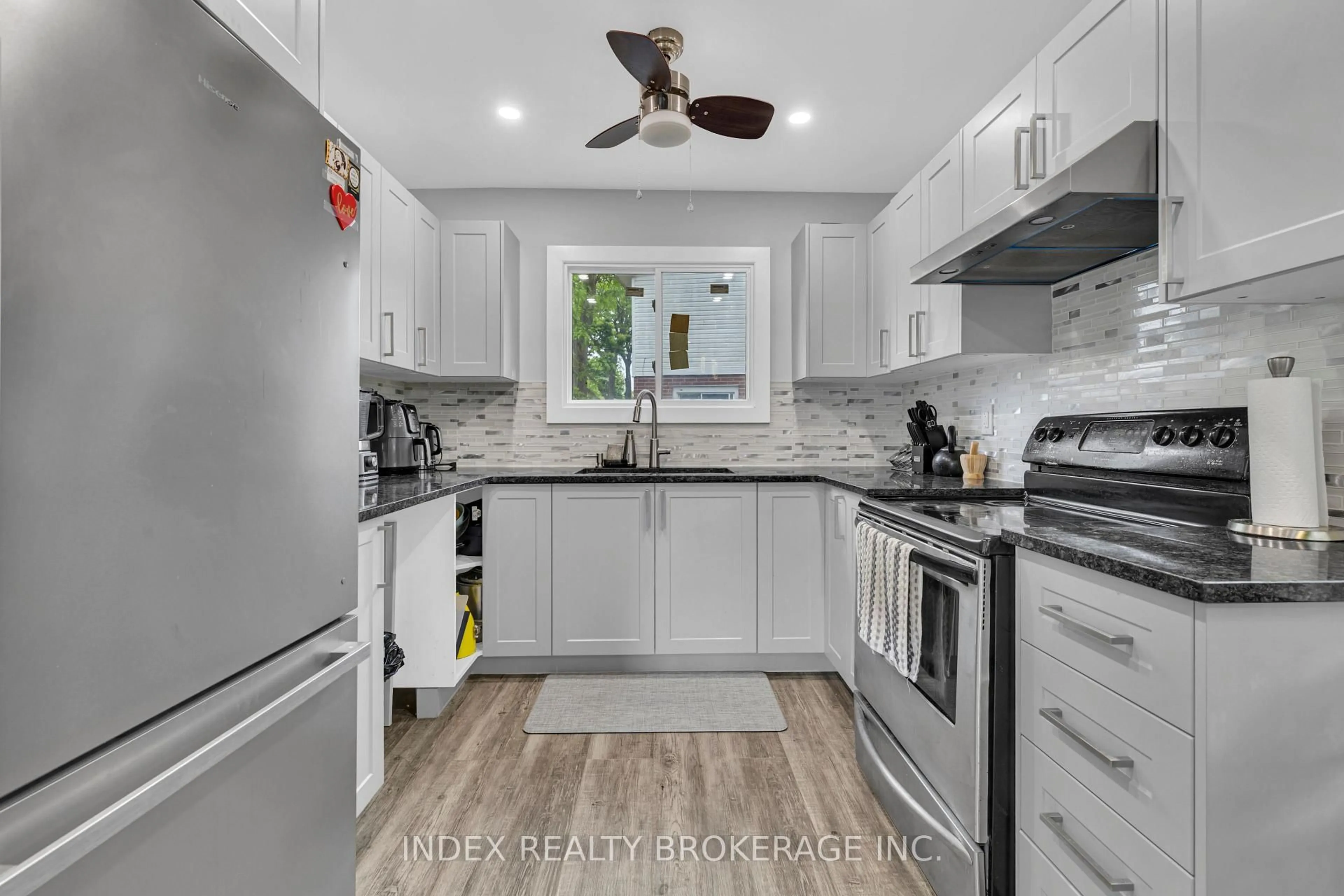 Open concept kitchen, ceramic/tile floor for 1290 Abbey Crt, Windsor Ontario N8S 4C9