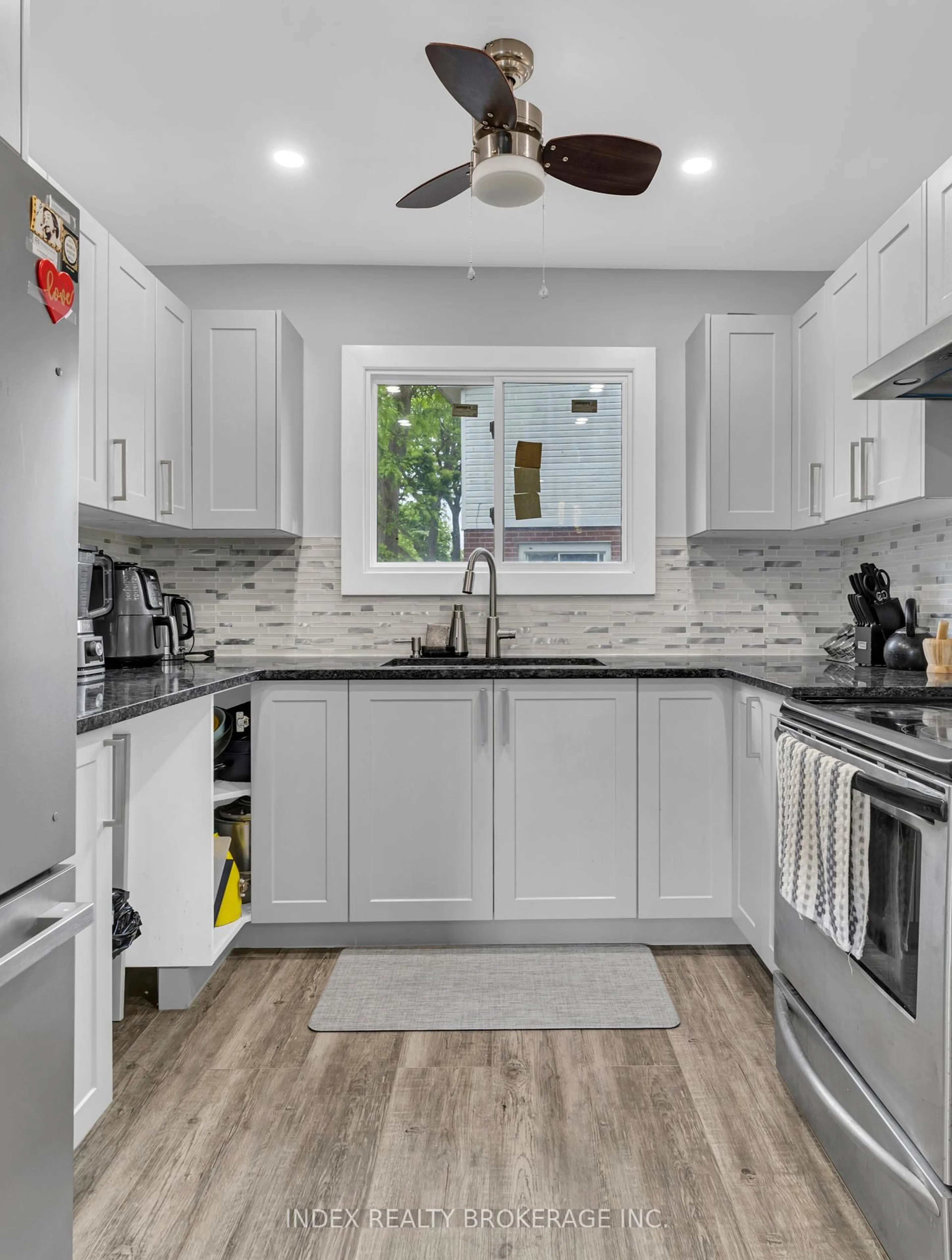 Open concept kitchen, ceramic/tile floor for 1290 Abbey Crt, Windsor Ontario N8S 4C9