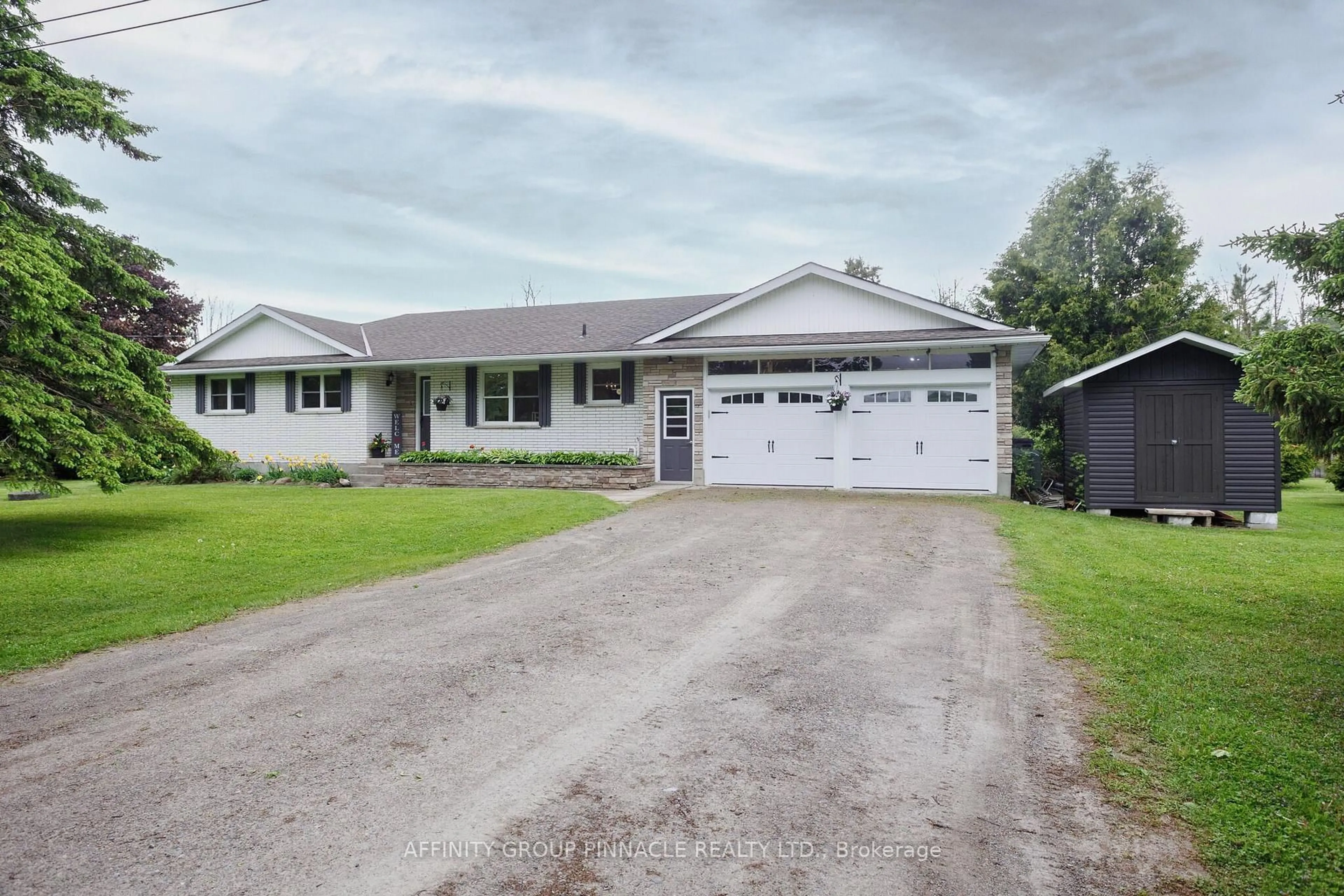 A pic from outside/outdoor area/front of a property/back of a property/a pic from drone, street for 1469 Elm Tree Rd, Kawartha Lakes Ontario K9V 4R2