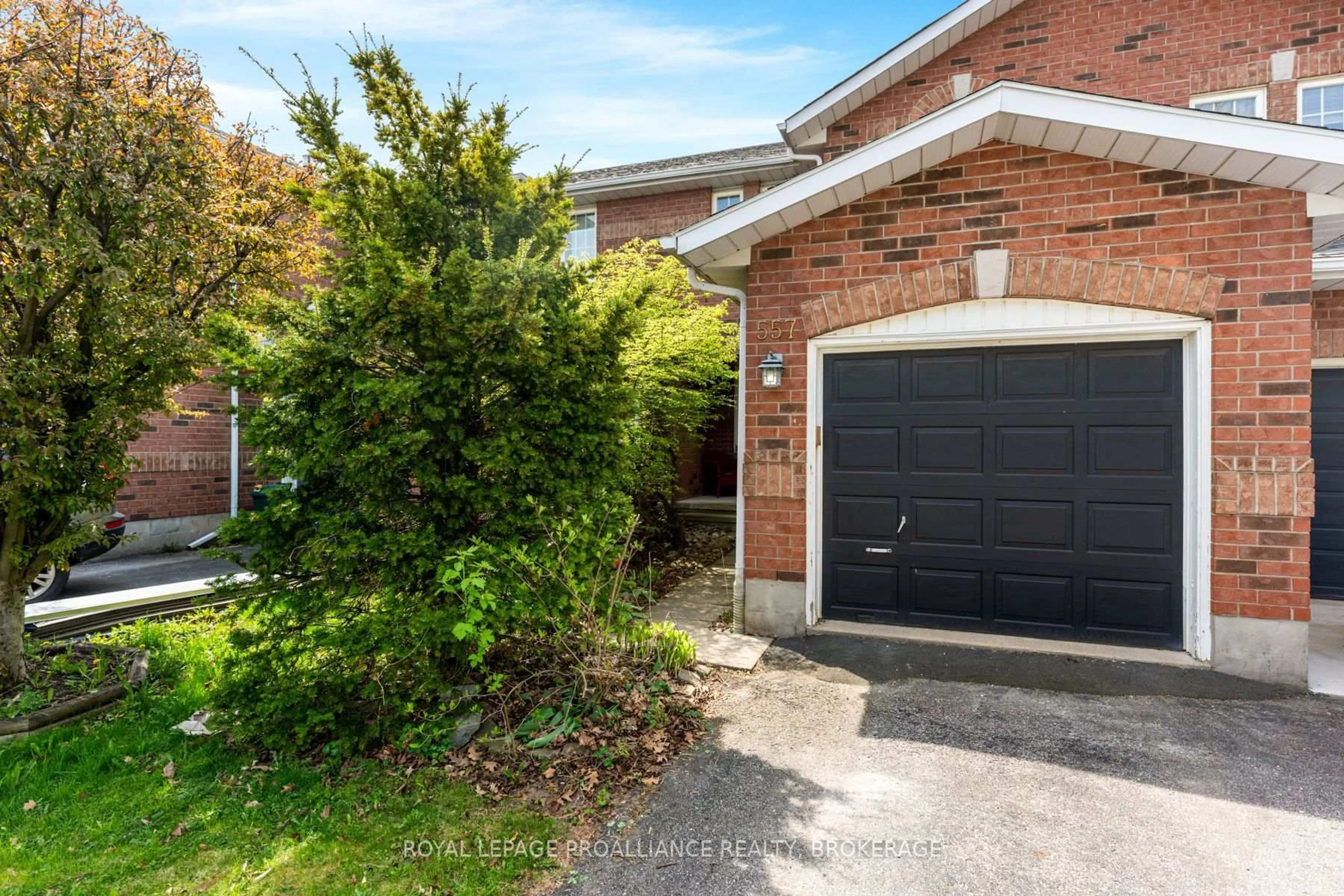 Home with brick exterior material, street for 557 Quail Crt, Kingston Ontario K7M 8Z4