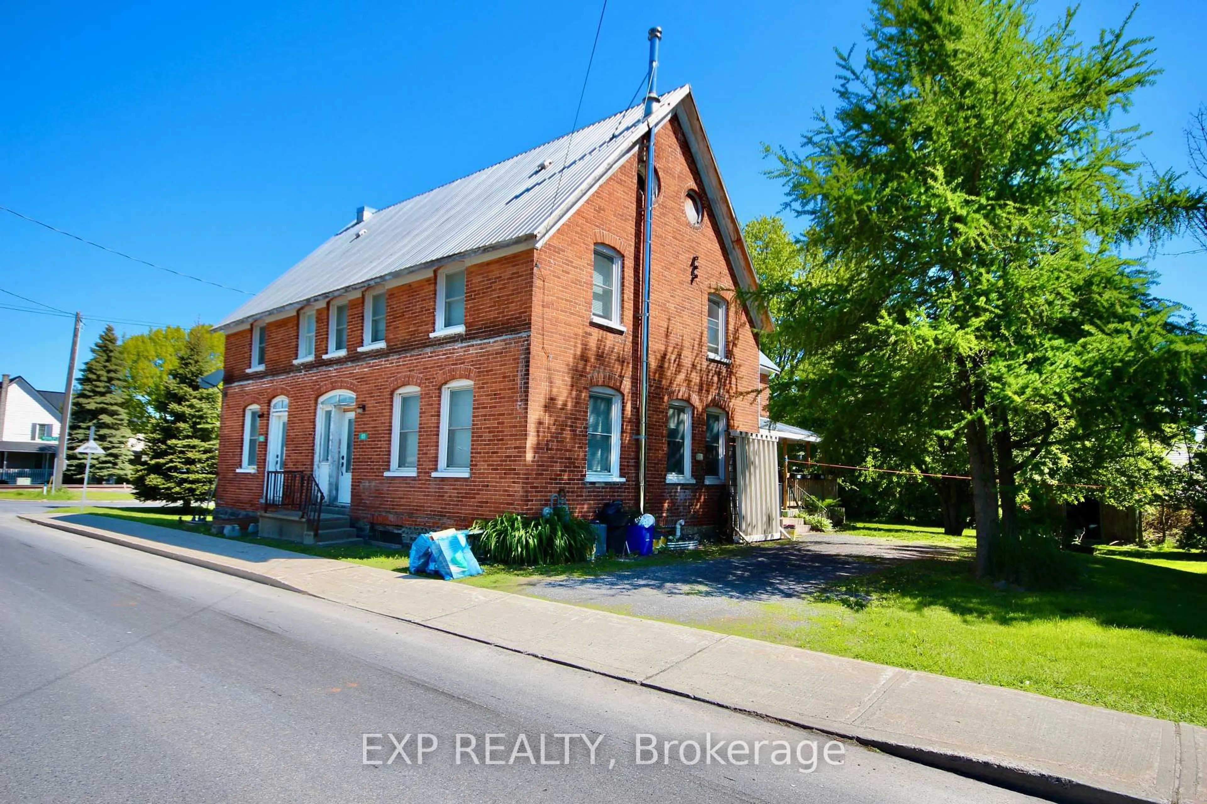 A pic from outside/outdoor area/front of a property/back of a property/a pic from drone, building for 40 Main St #40 & 42, North Stormont Ontario K0C 0B2