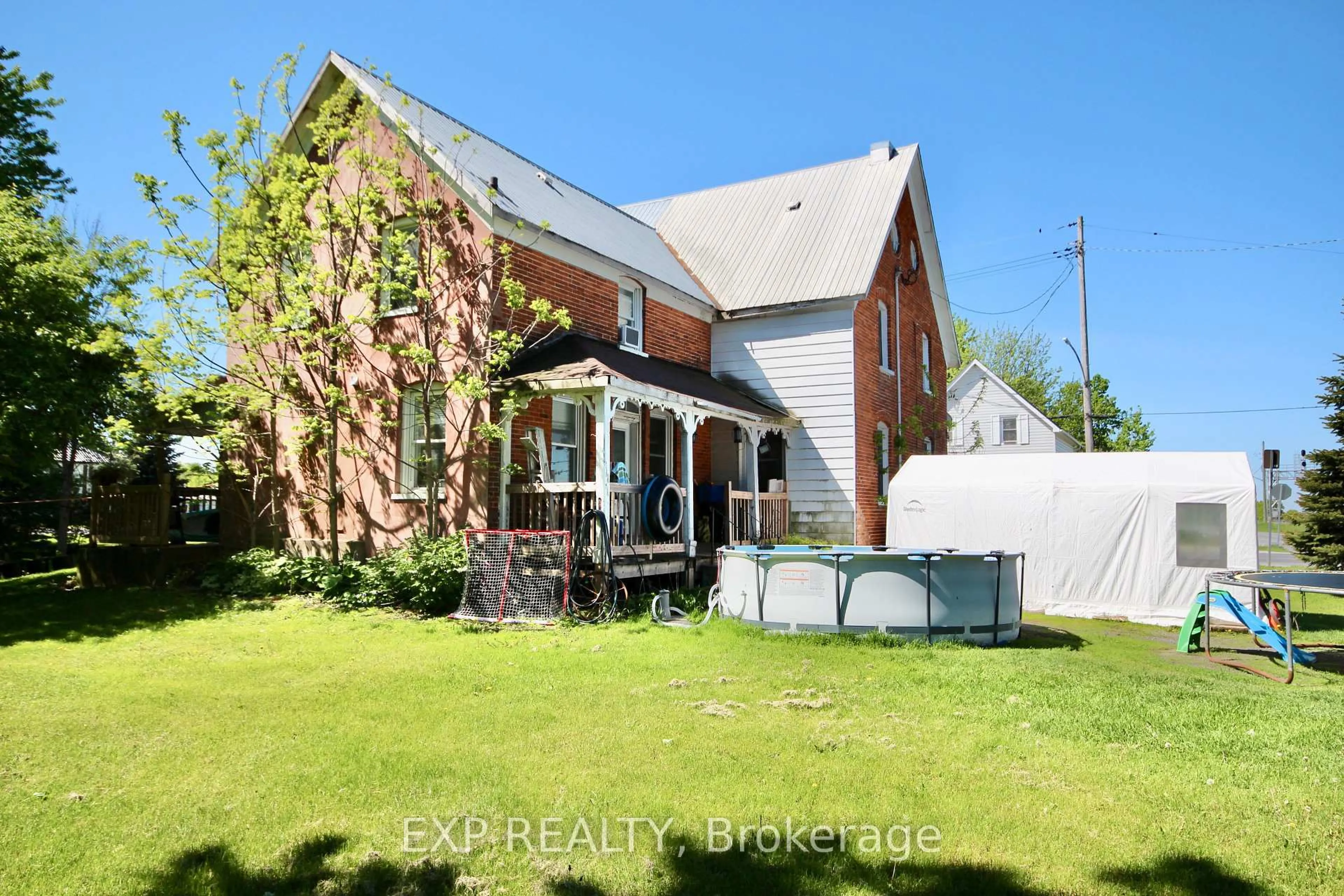 A pic from outside/outdoor area/front of a property/back of a property/a pic from drone, street for 40 Main St #40 & 42, North Stormont Ontario K0C 0B2