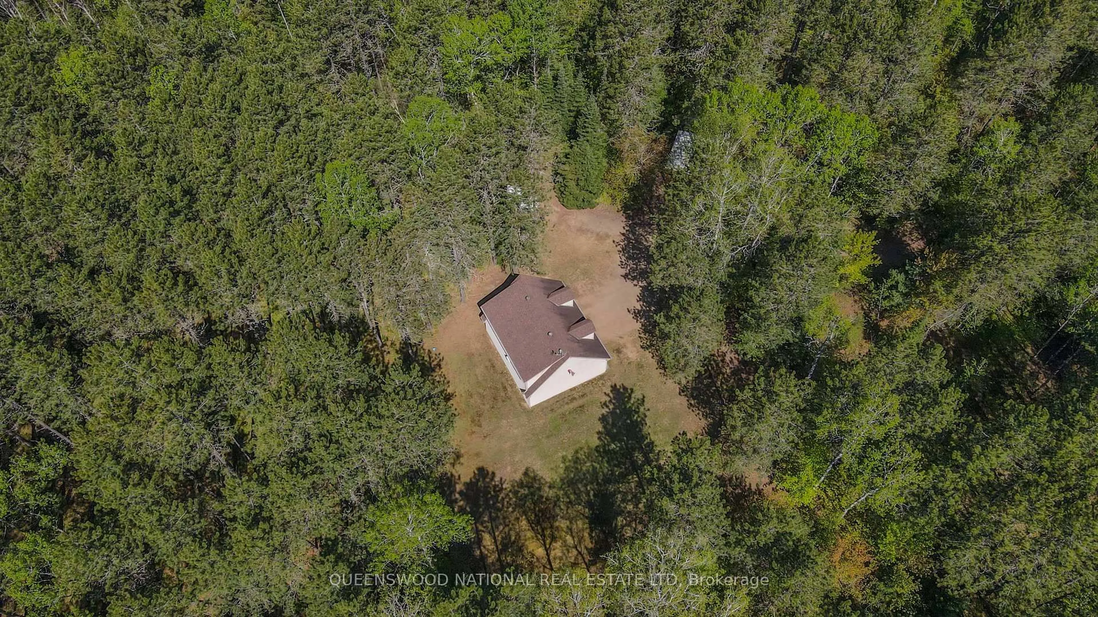 A pic from outside/outdoor area/front of a property/back of a property/a pic from drone, forest/trees view for 1315 Major Lake Rd, South Algonquin Ontario K0J 2M0