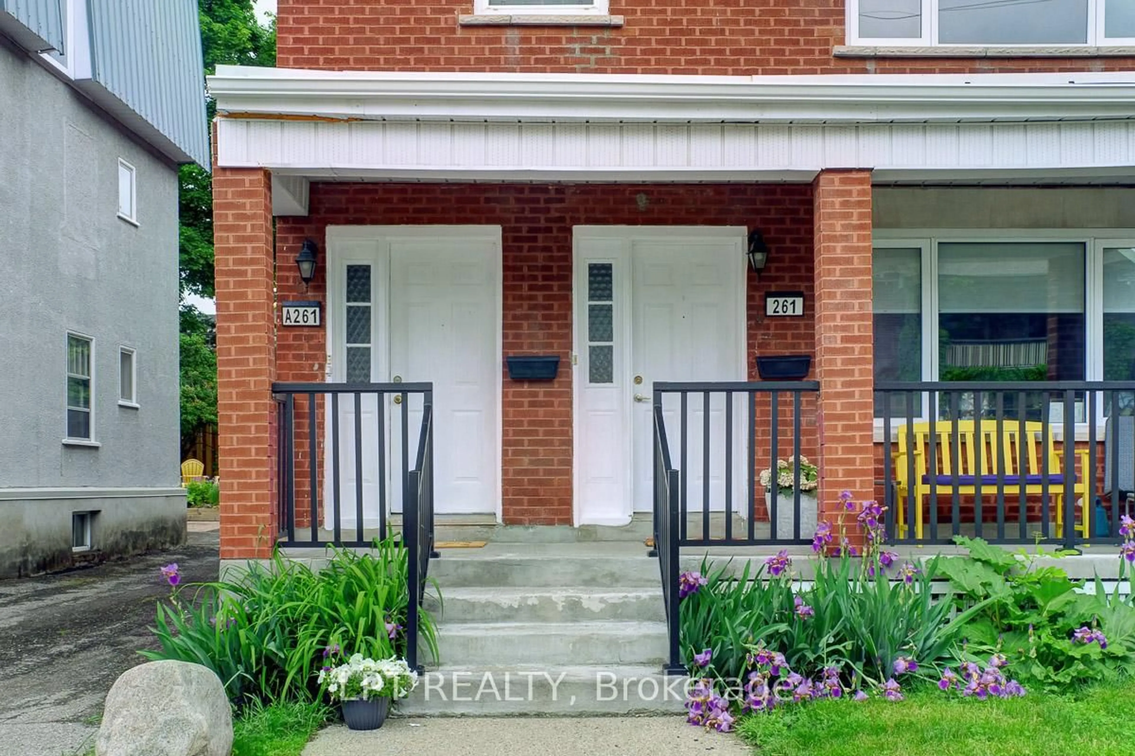 Home with brick exterior material, street for 261 Holmwood Ave, Ottawa Ontario K1S 2P8