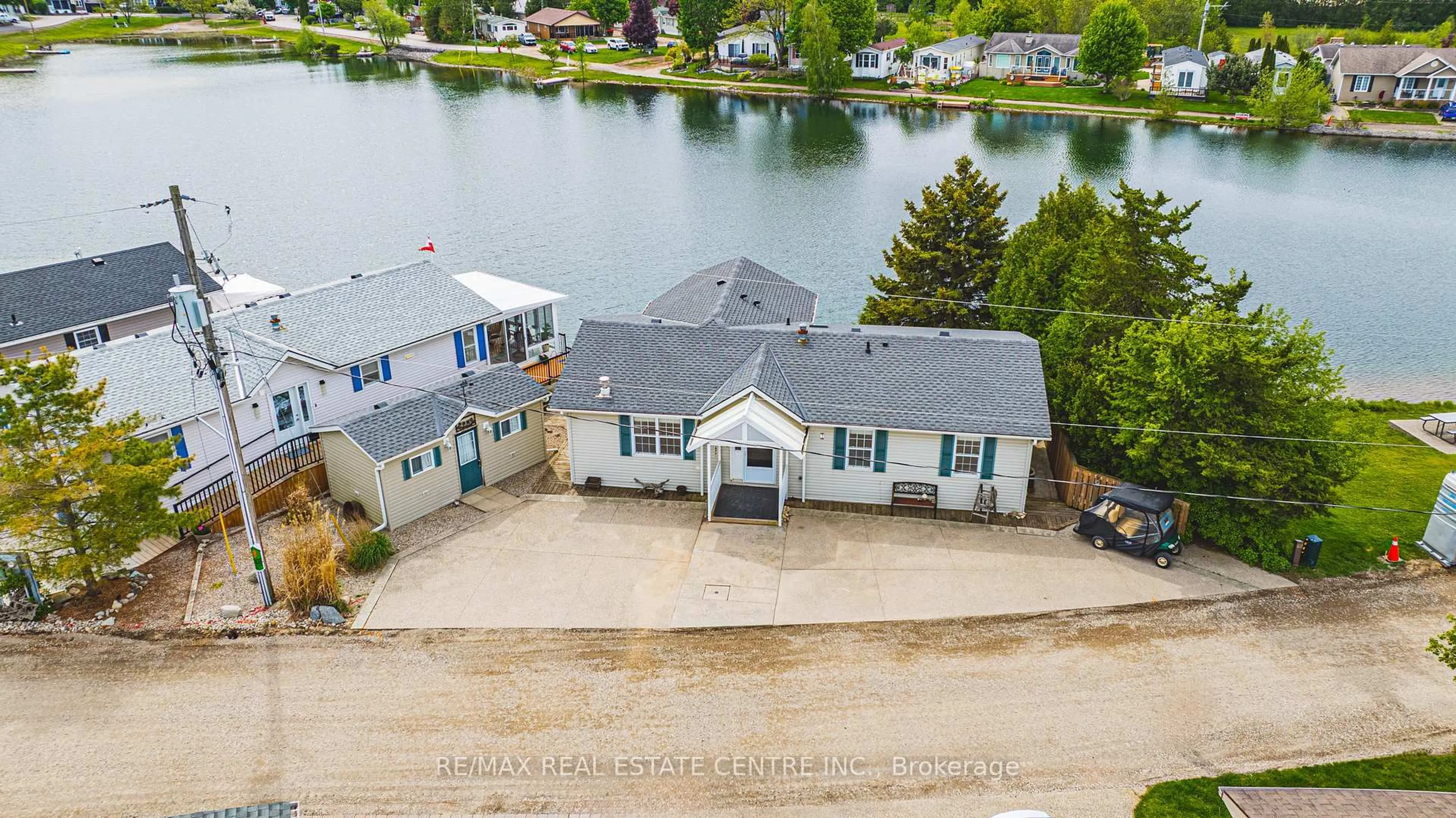 A pic from outside/outdoor area/front of a property/back of a property/a pic from drone, water/lake/river/ocean view for 2 Hemlock Crescent Pvt Cres, Puslinch Ontario N0B 2K0