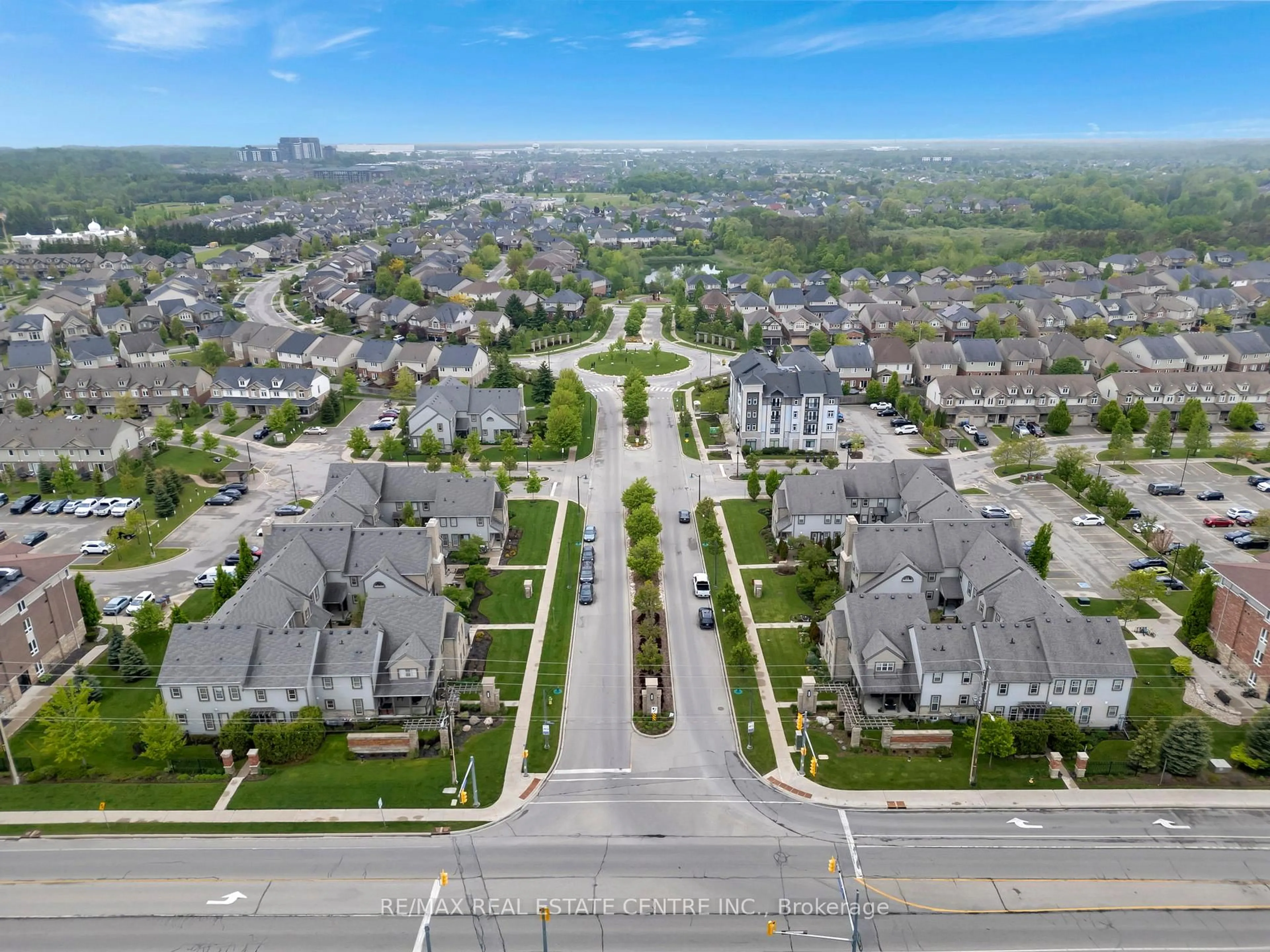 A pic from outside/outdoor area/front of a property/back of a property/a pic from drone, street for 101 Frederick Dr #13, Guelph Ontario N1L 0K7