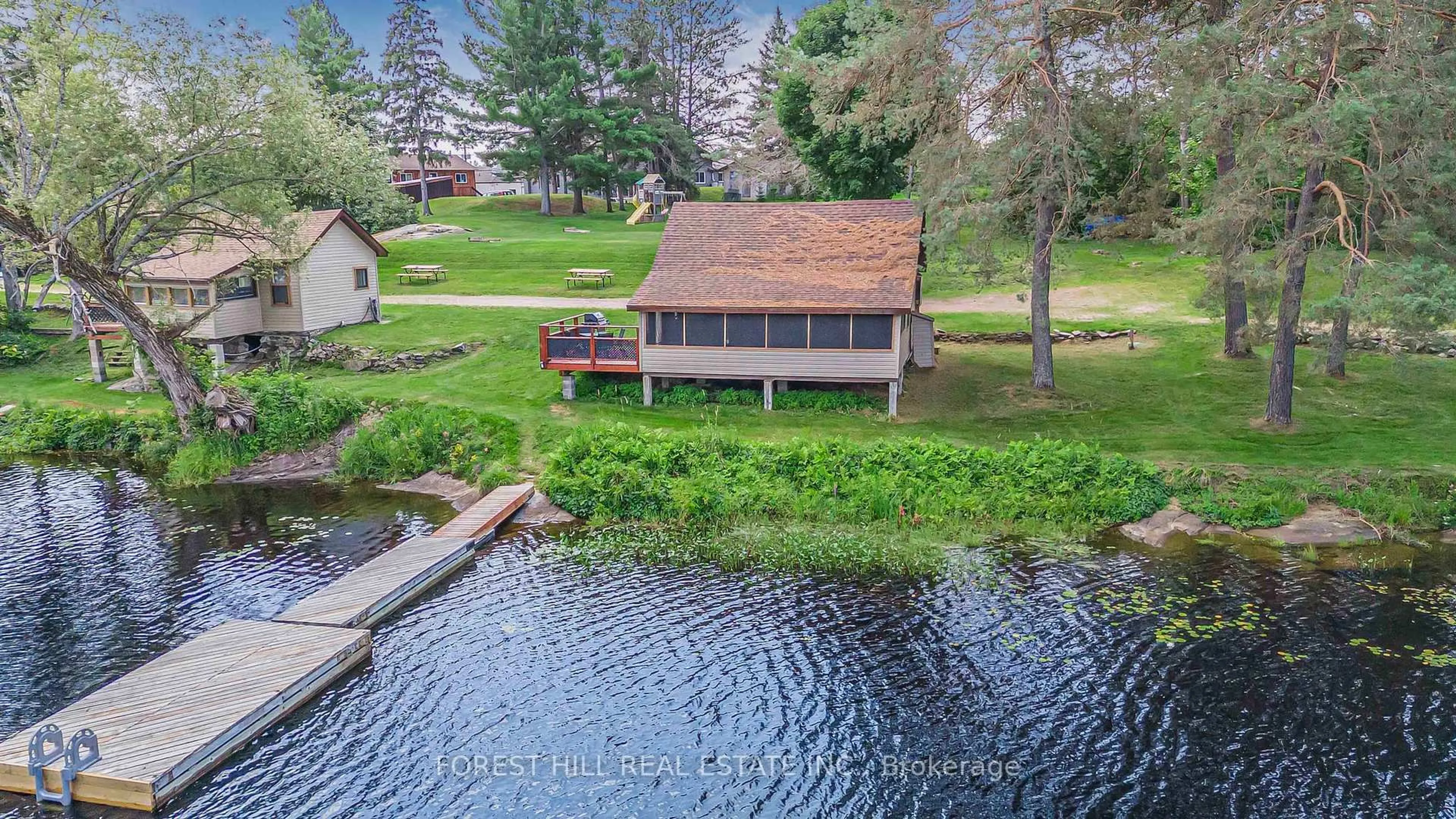 A pic from outside/outdoor area/front of a property/back of a property/a pic from drone, water/lake/river/ocean view for 2216 Hwy 124, Whitestone Ontario P0A 1G0