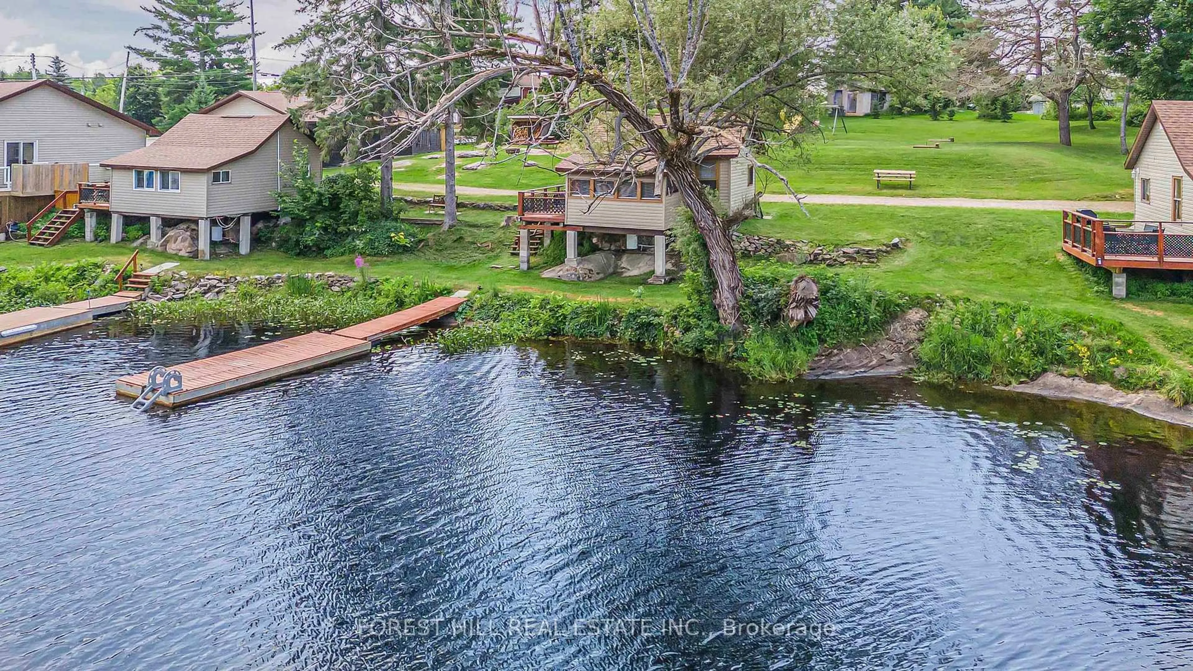 A pic from outside/outdoor area/front of a property/back of a property/a pic from drone, water/lake/river/ocean view for 2216 Hwy 124, Whitestone Ontario P0A 1G0
