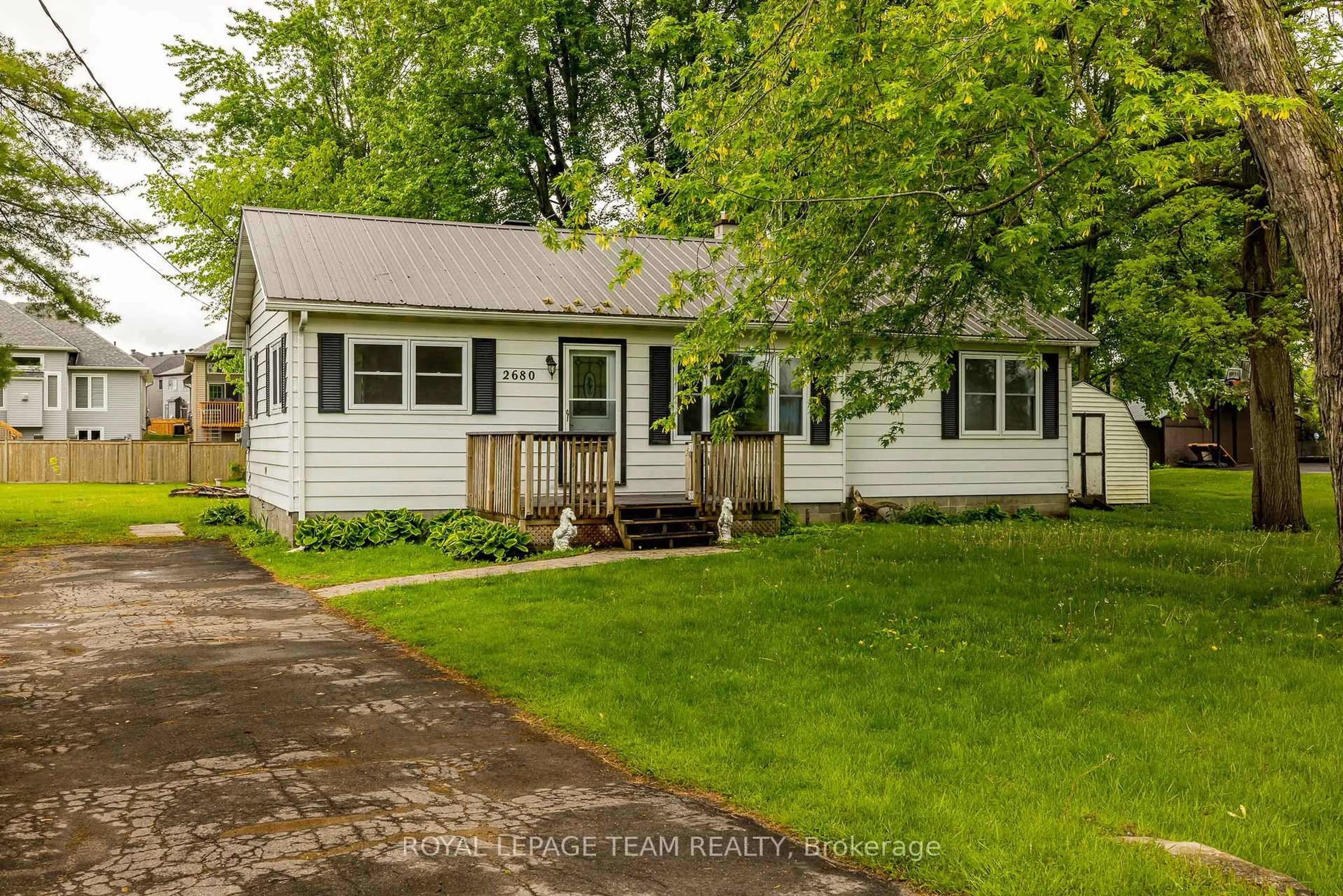 Home with vinyl exterior material, street for 2680 River Rd, North Grenville Ontario K0G 1J0