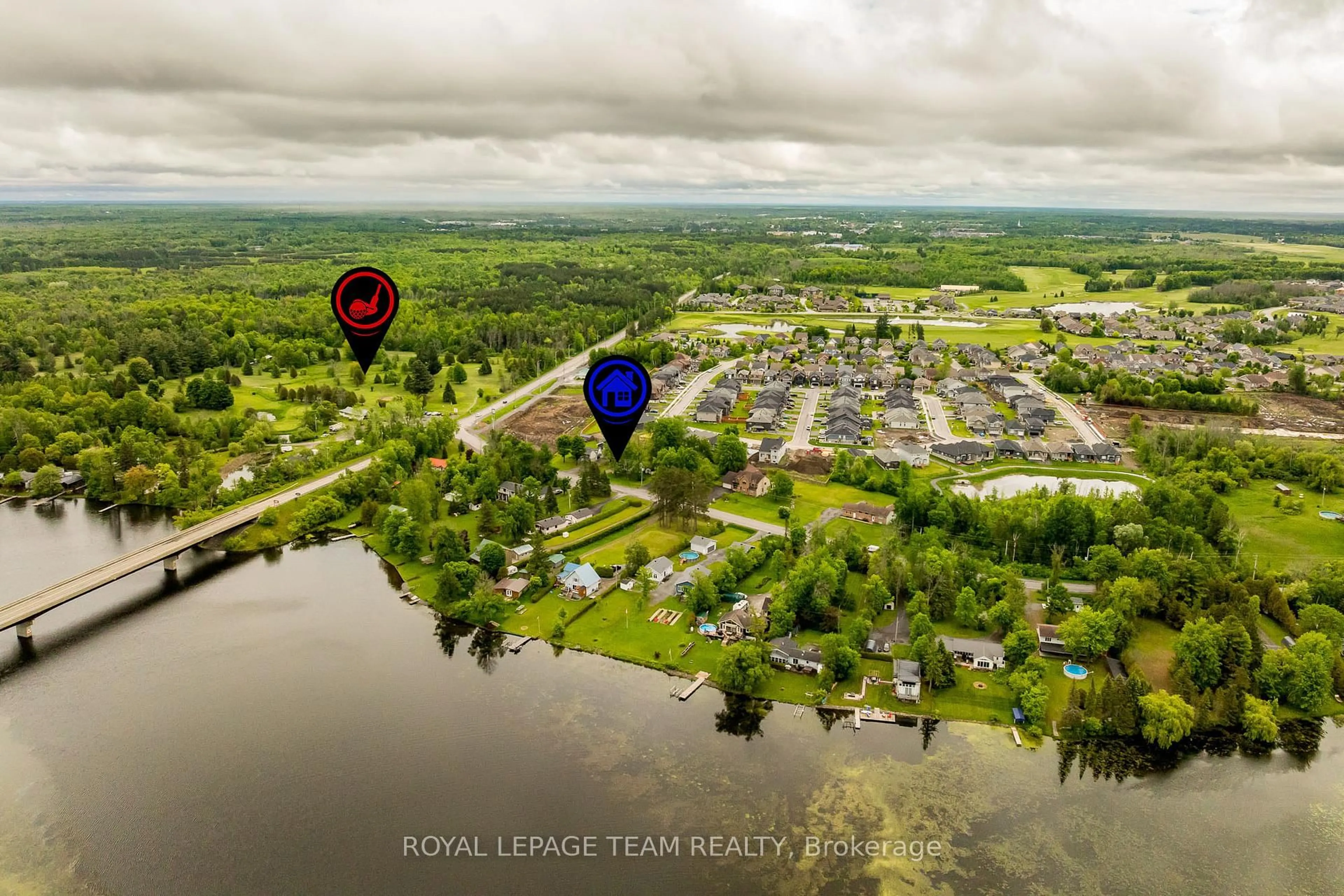 A pic from outside/outdoor area/front of a property/back of a property/a pic from drone, water/lake/river/ocean view for 2680 River Rd, North Grenville Ontario K0G 1J0