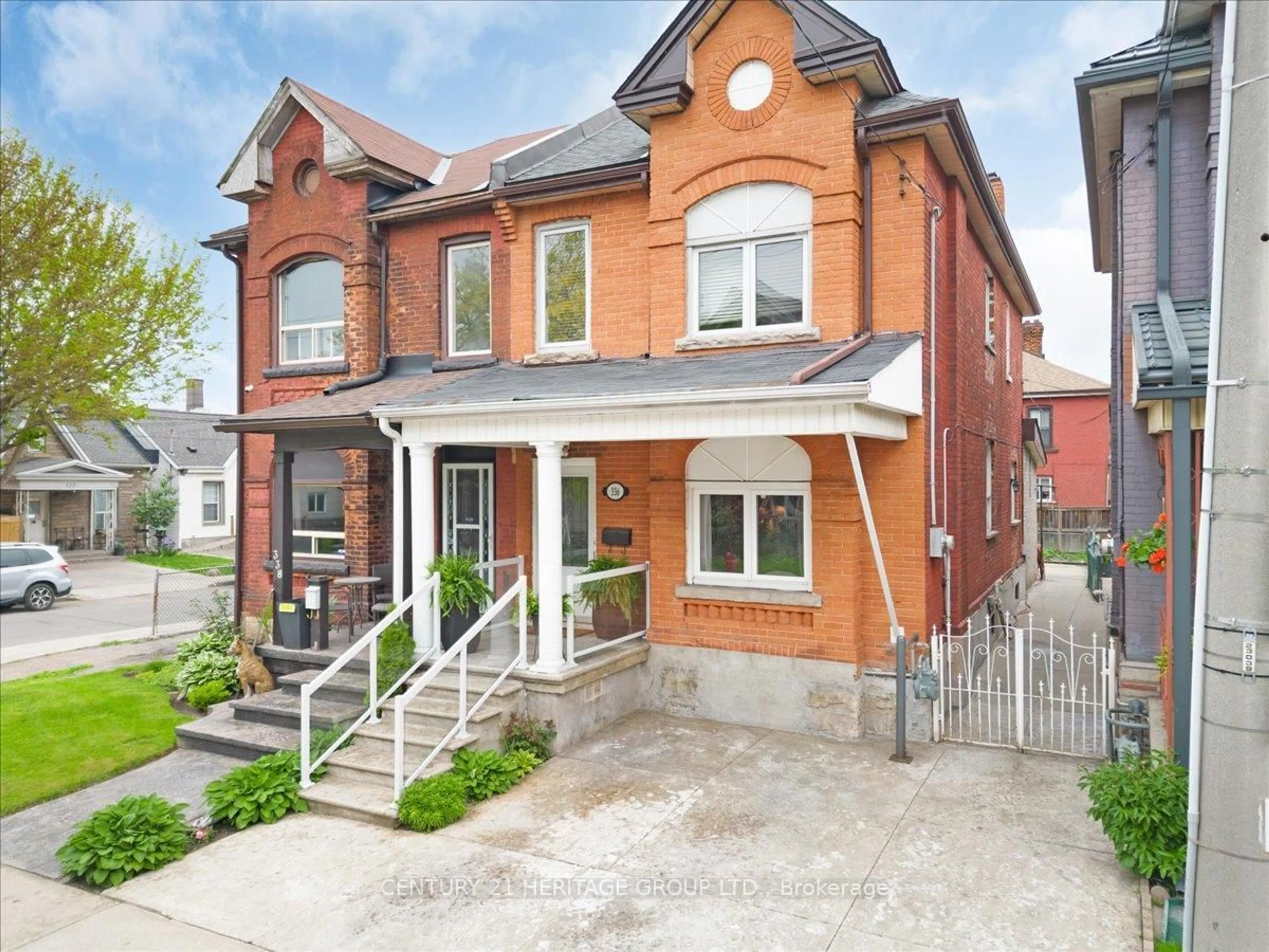 Home with brick exterior material, street for 336 Emerald St, Hamilton Ontario L8L 5L3