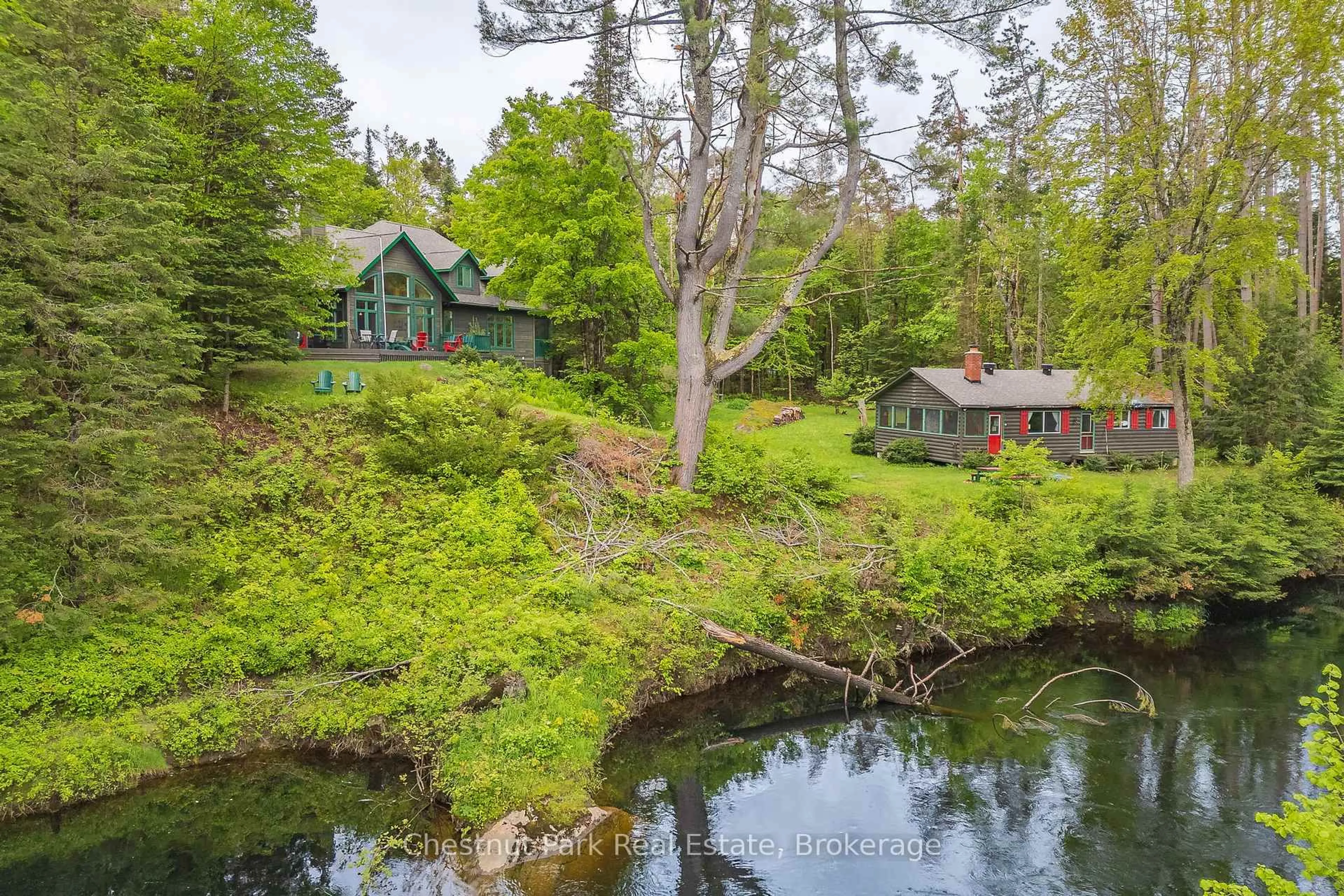 A pic from outside/outdoor area/front of a property/back of a property/a pic from drone, water/lake/river/ocean view for 1230 MIRIAM Dr #1 & 2, Bracebridge Ontario P1L 1X1