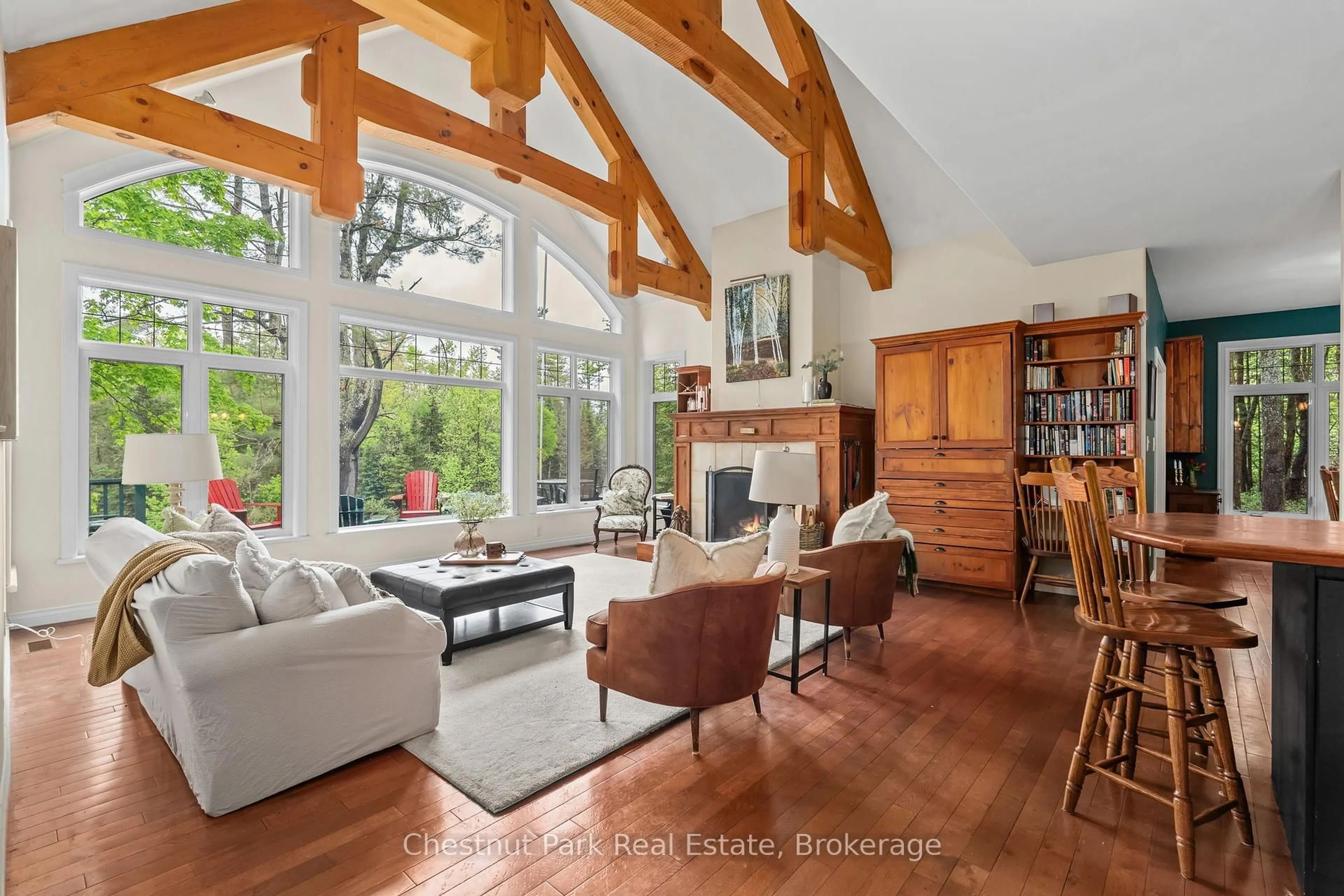Living room with furniture, wood/laminate floor for 1230 MIRIAM Dr #1 & 2, Bracebridge Ontario P1L 1X1