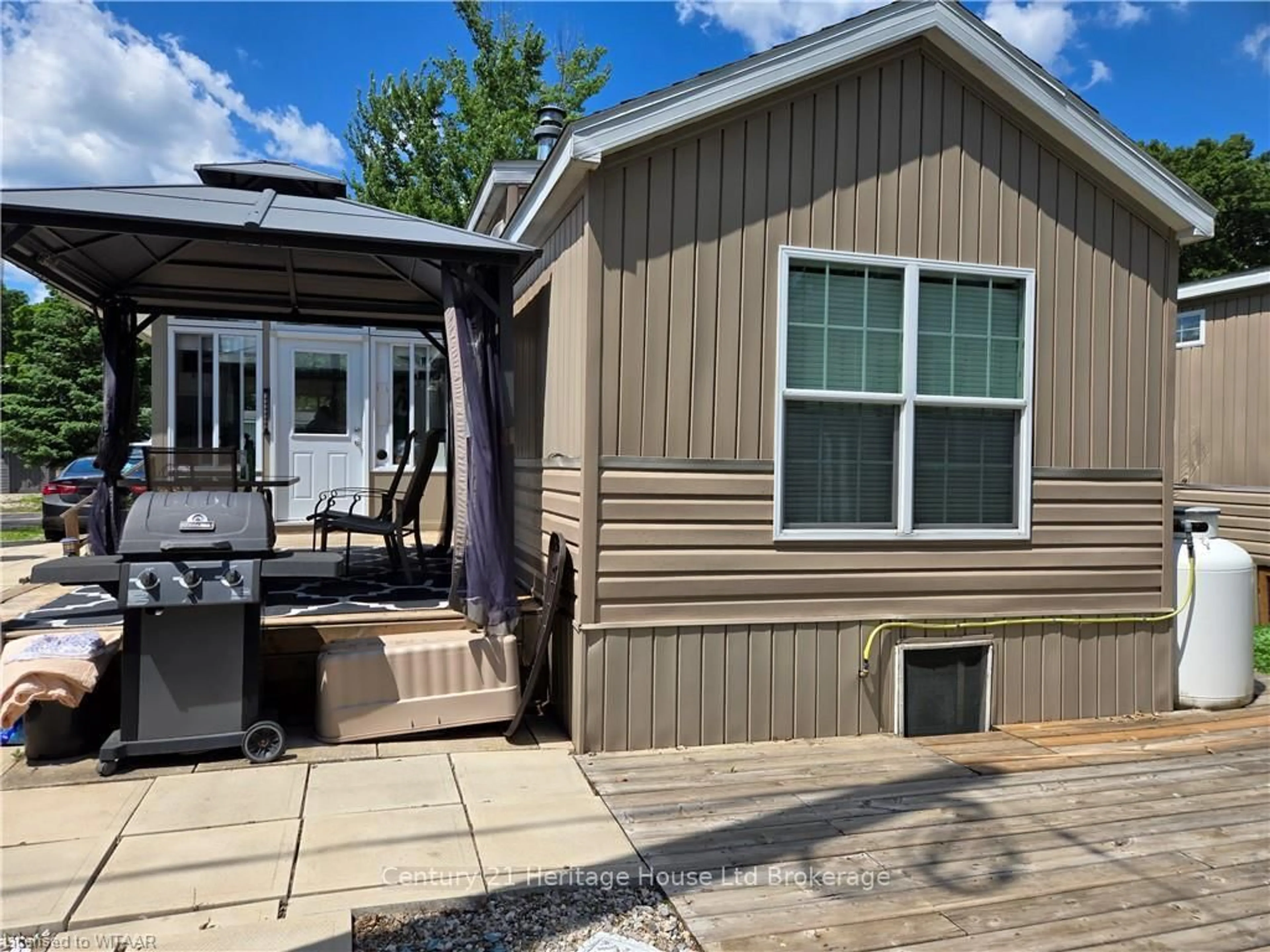 Home with vinyl exterior material, street for 296 West Quarter Town Li Rd #54, Brant Ontario N0E 1E0