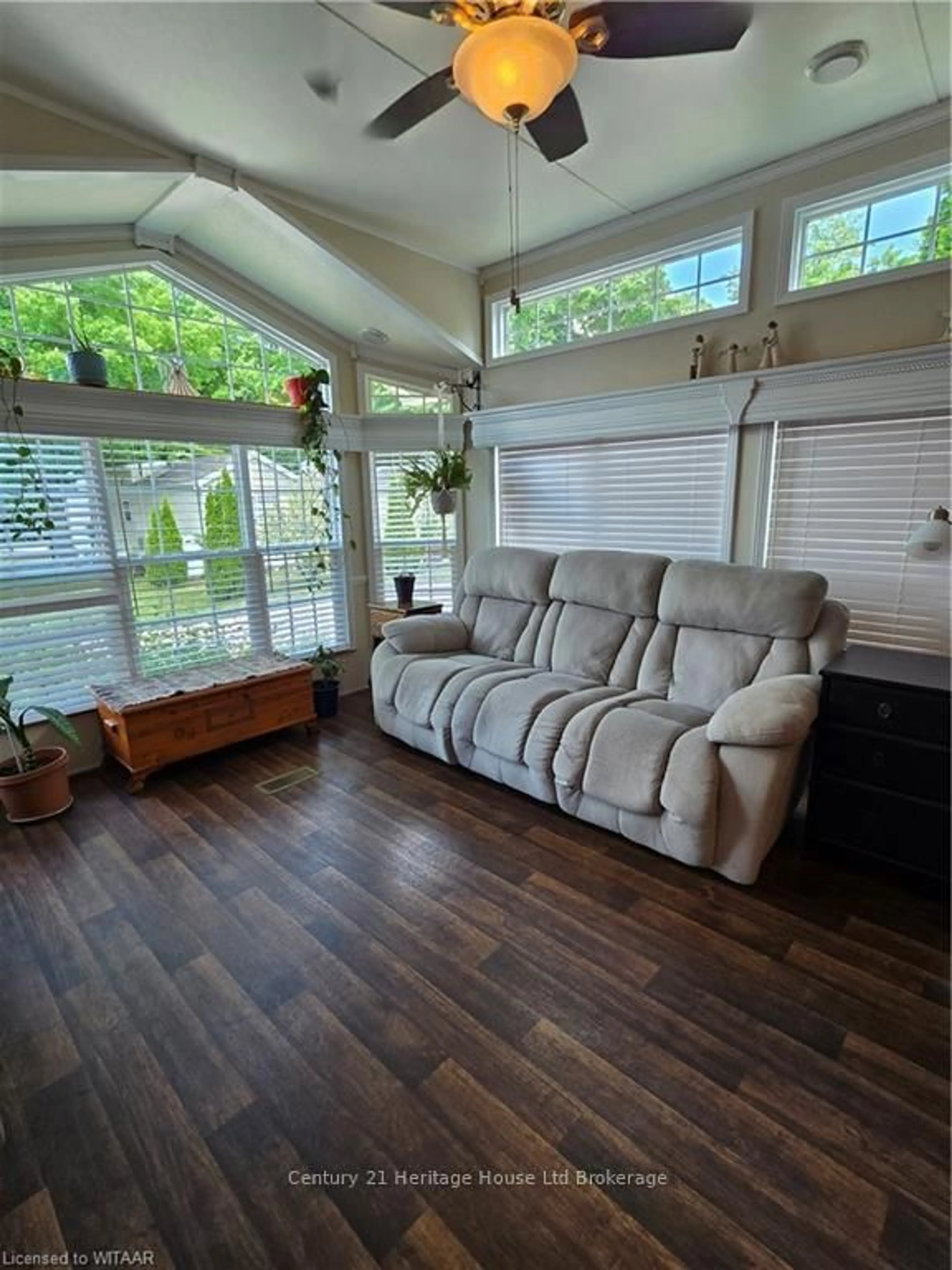 Living room with furniture, wood/laminate floor for 296 West Quarter Town Li Rd #54, Brant Ontario N0E 1E0