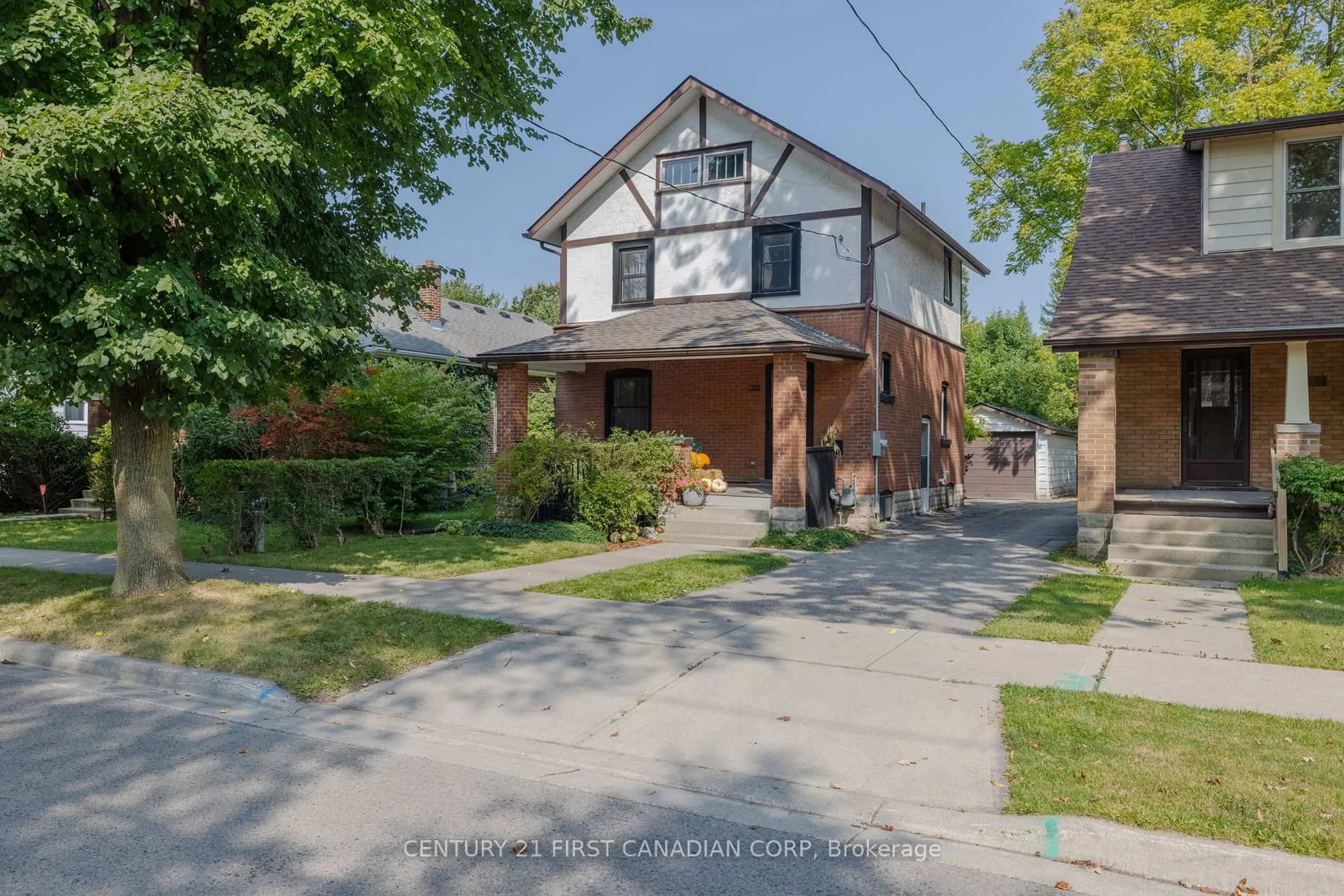 Home with brick exterior material, street for 170 Langarth St, London South Ontario N6C 1Z5