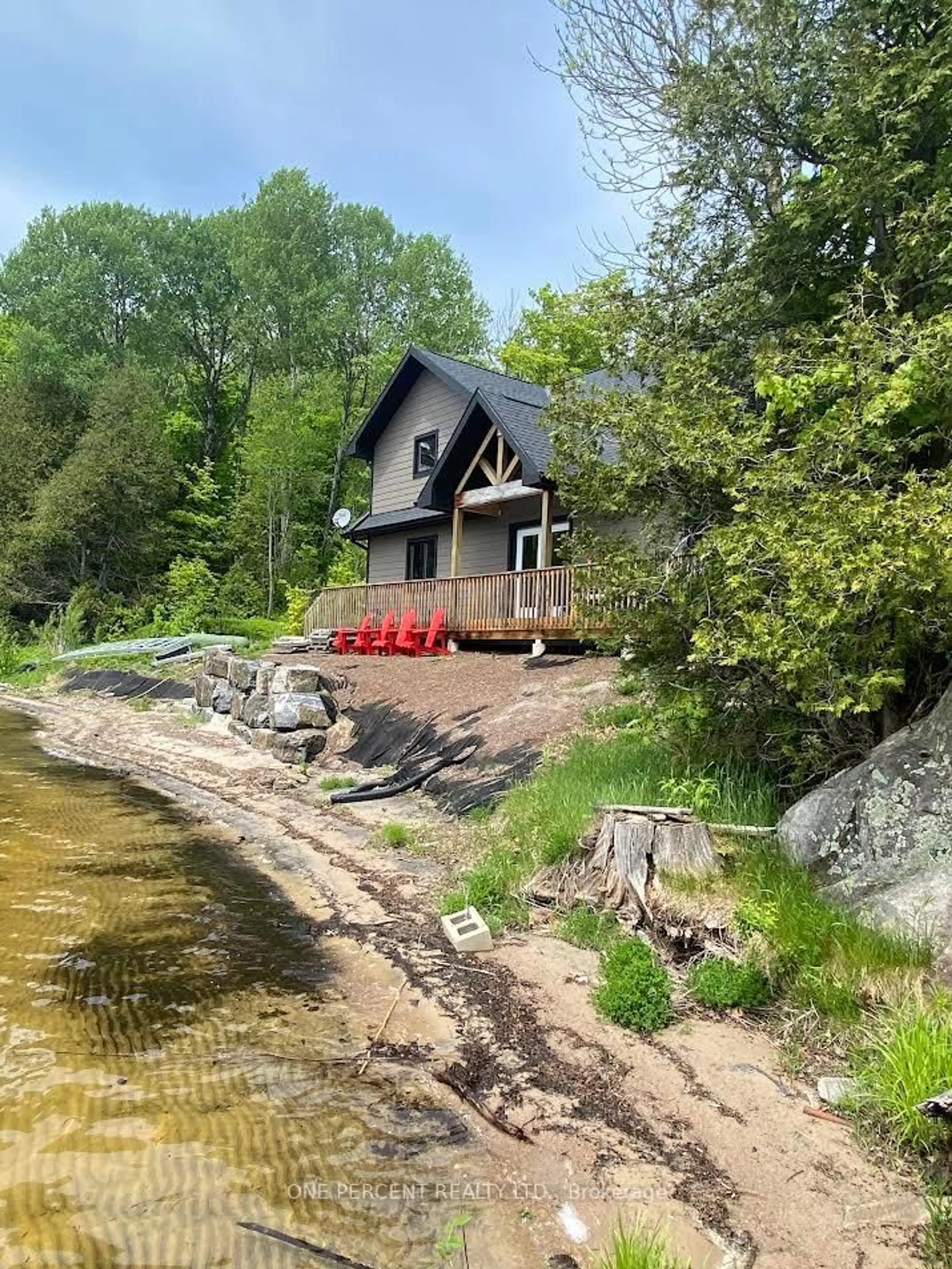 A pic from outside/outdoor area/front of a property/back of a property/a pic from drone, water/lake/river/ocean view for 449 Star Lake Rd, Seguin Ontario P2A 2W8