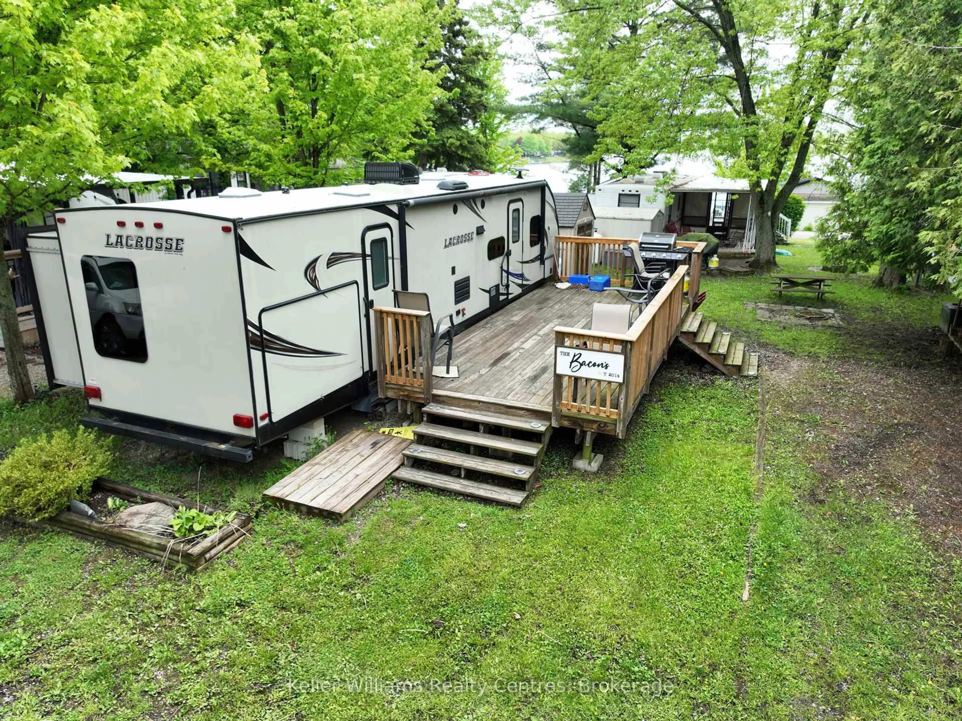 A pic from outside/outdoor area/front of a property/back of a property/a pic from drone, water/lake/river/ocean view for 13 Southline Ave #A84, Huron-Kinloss Ontario N2Z 2X5