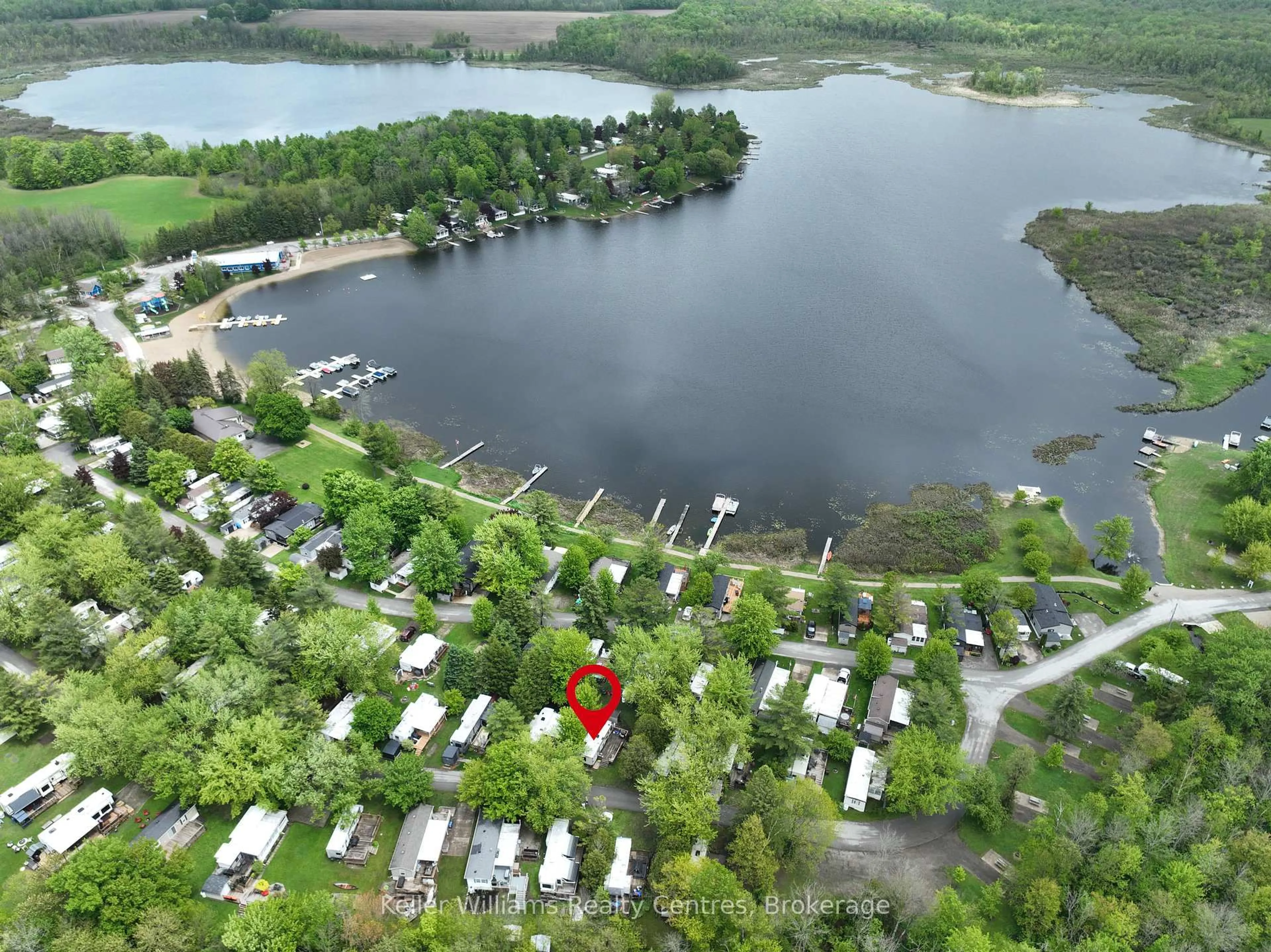 A pic from outside/outdoor area/front of a property/back of a property/a pic from drone, water/lake/river/ocean view for 13 Southline Ave #A84, Huron-Kinloss Ontario N2Z 2X5