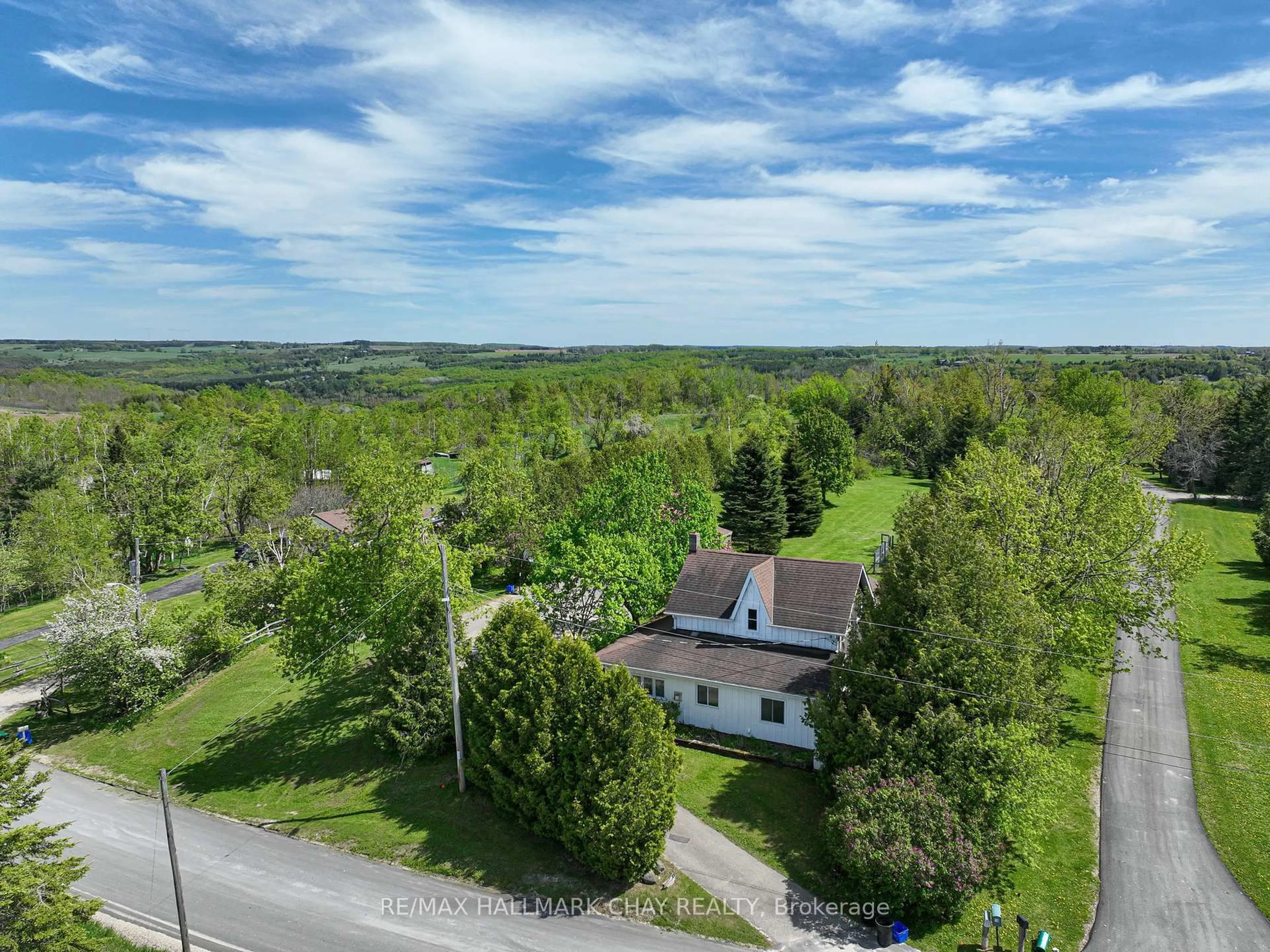A pic from outside/outdoor area/front of a property/back of a property/a pic from drone, unknown for 22 Mill Lane, Melancthon Ontario L9V 2T9
