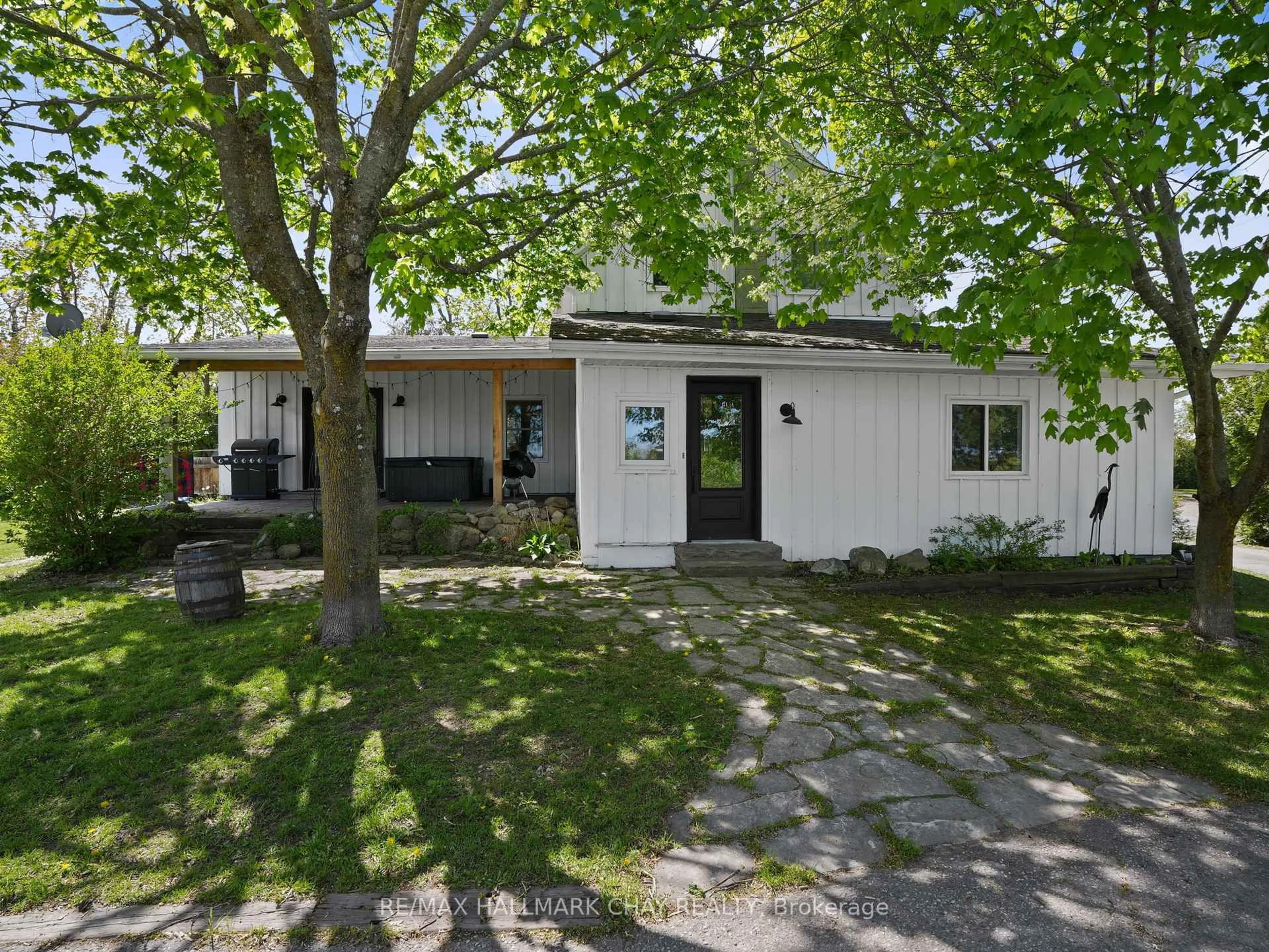 Home with vinyl exterior material, street for 22 Mill Lane, Melancthon Ontario L9V 2T9
