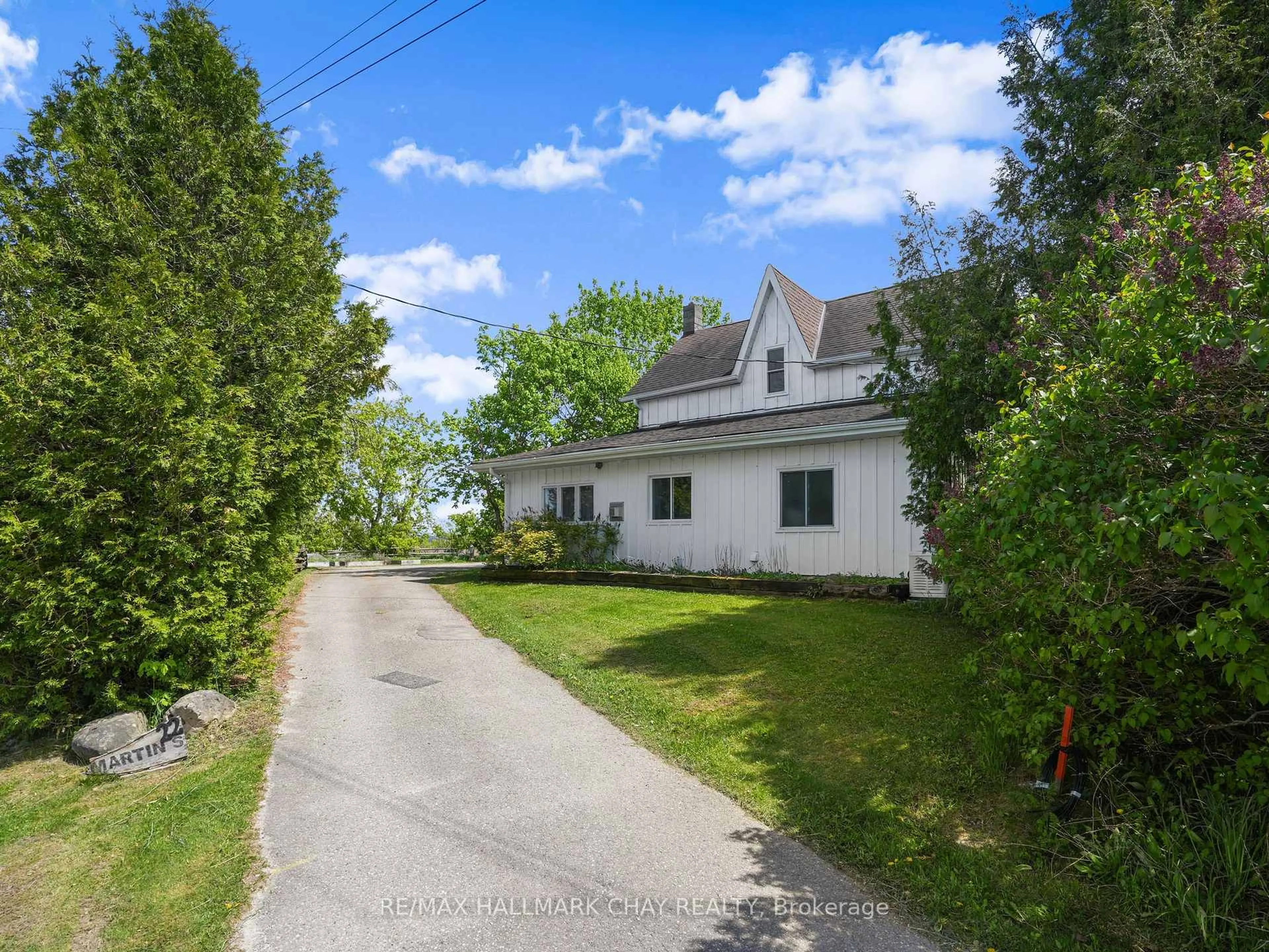 A pic from outside/outdoor area/front of a property/back of a property/a pic from drone, street for 22 Mill Lane, Melancthon Ontario L9V 2T9