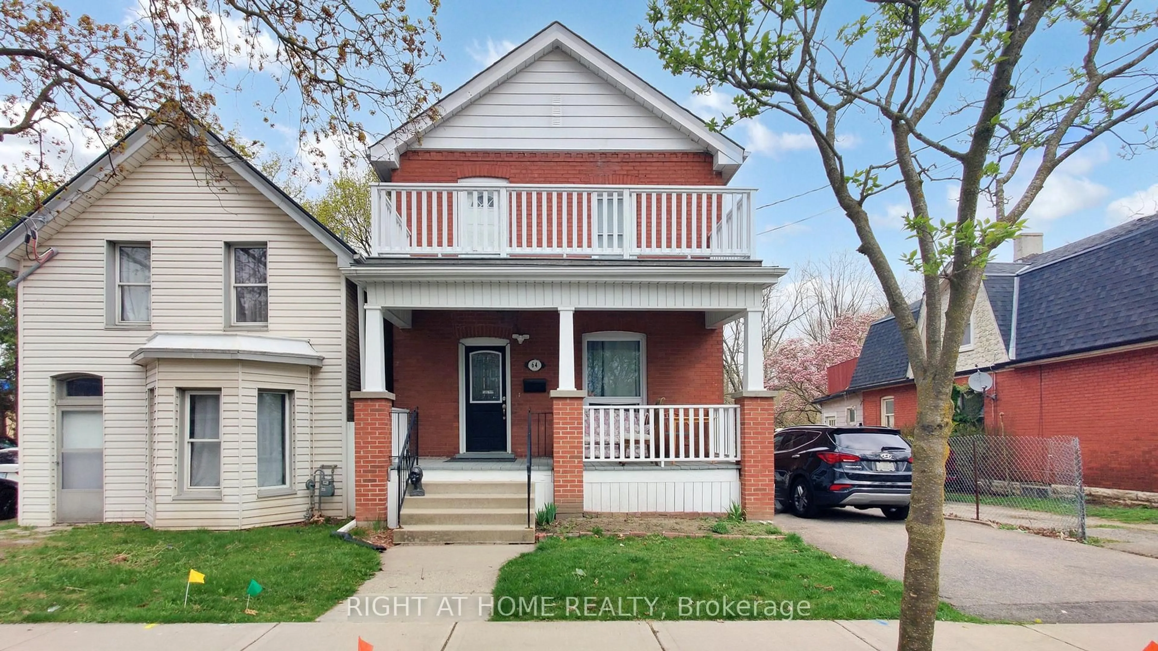 Home with brick exterior material, street for 64 Eagle Ave, Brant Ontario N3S 1Y9