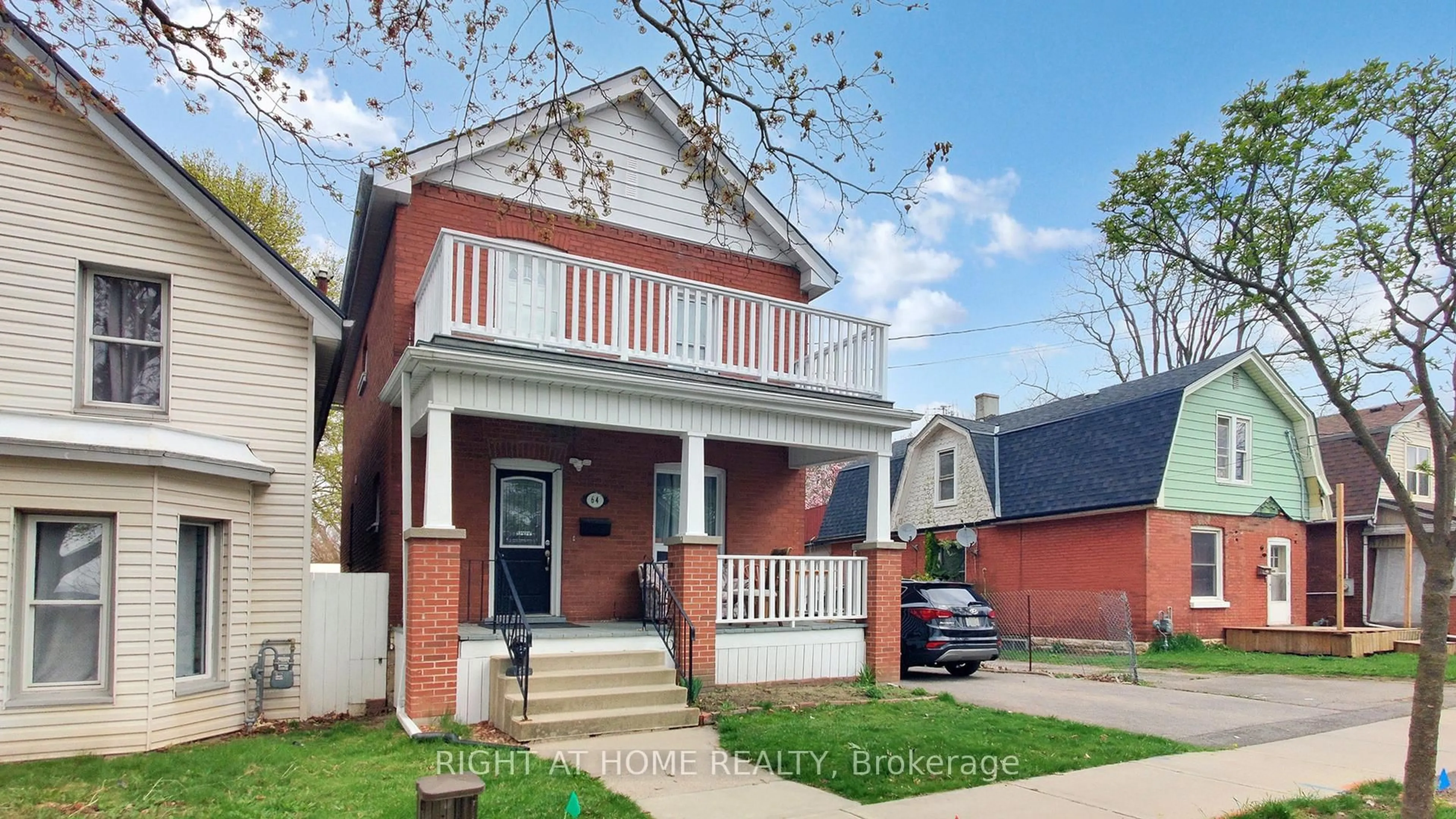 Home with brick exterior material, street for 64 Eagle Ave, Brant Ontario N3S 1Y9