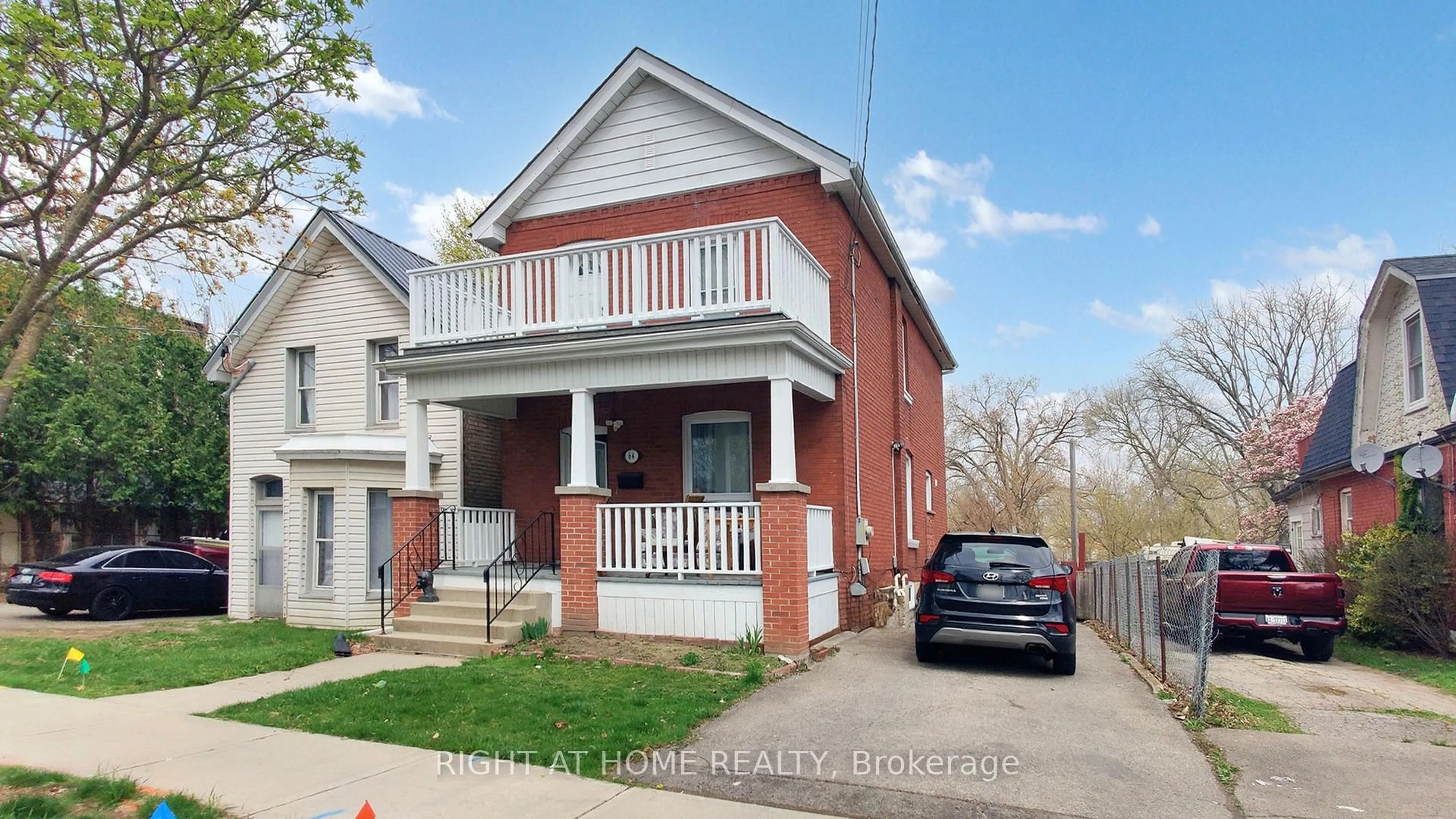 Home with brick exterior material, street for 64 Eagle Ave, Brant Ontario N3S 1Y9