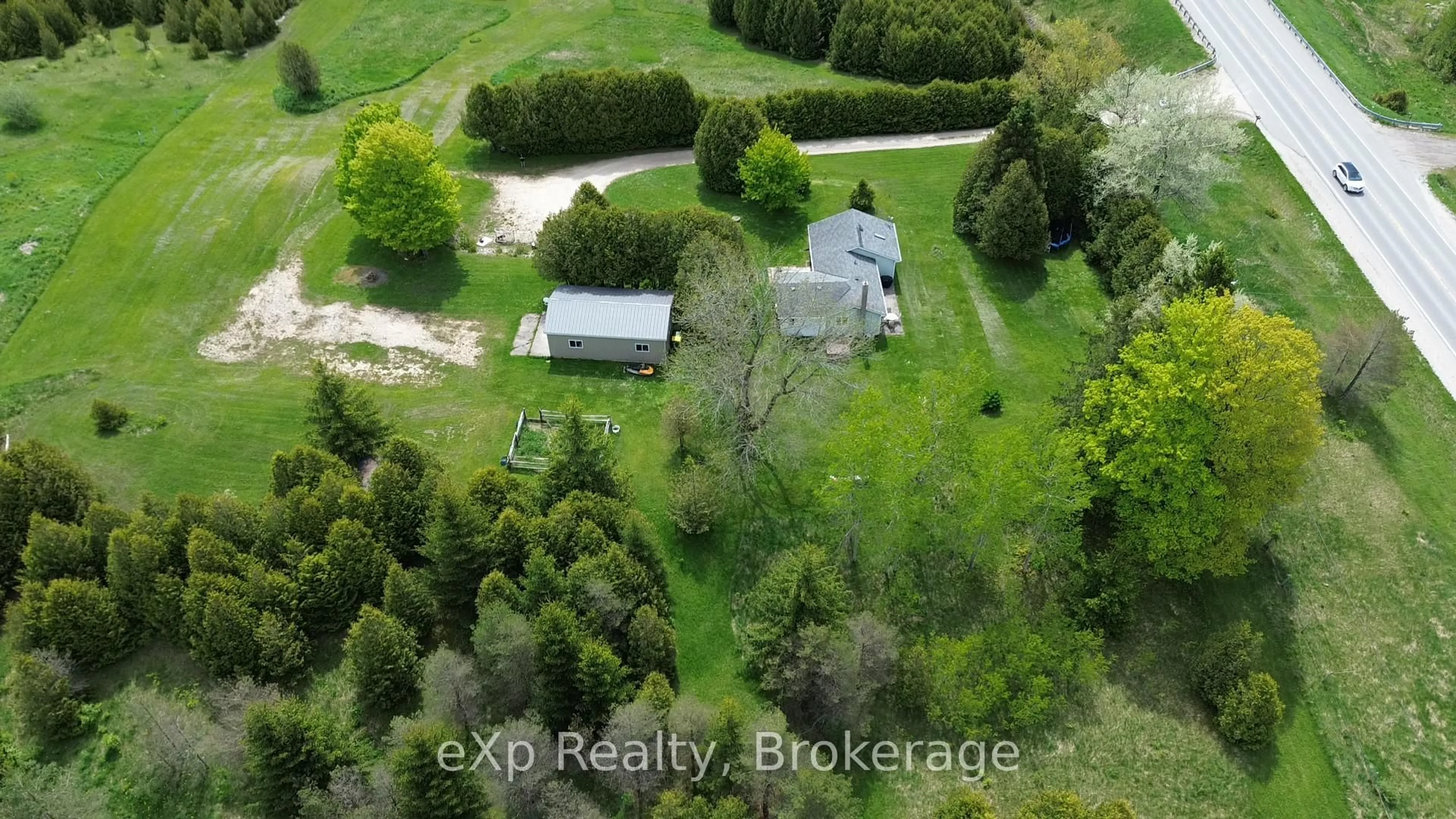 A pic from outside/outdoor area/front of a property/back of a property/a pic from drone, unknown for 775355 10 Highway, Grey Highlands Ontario N0C 1H0